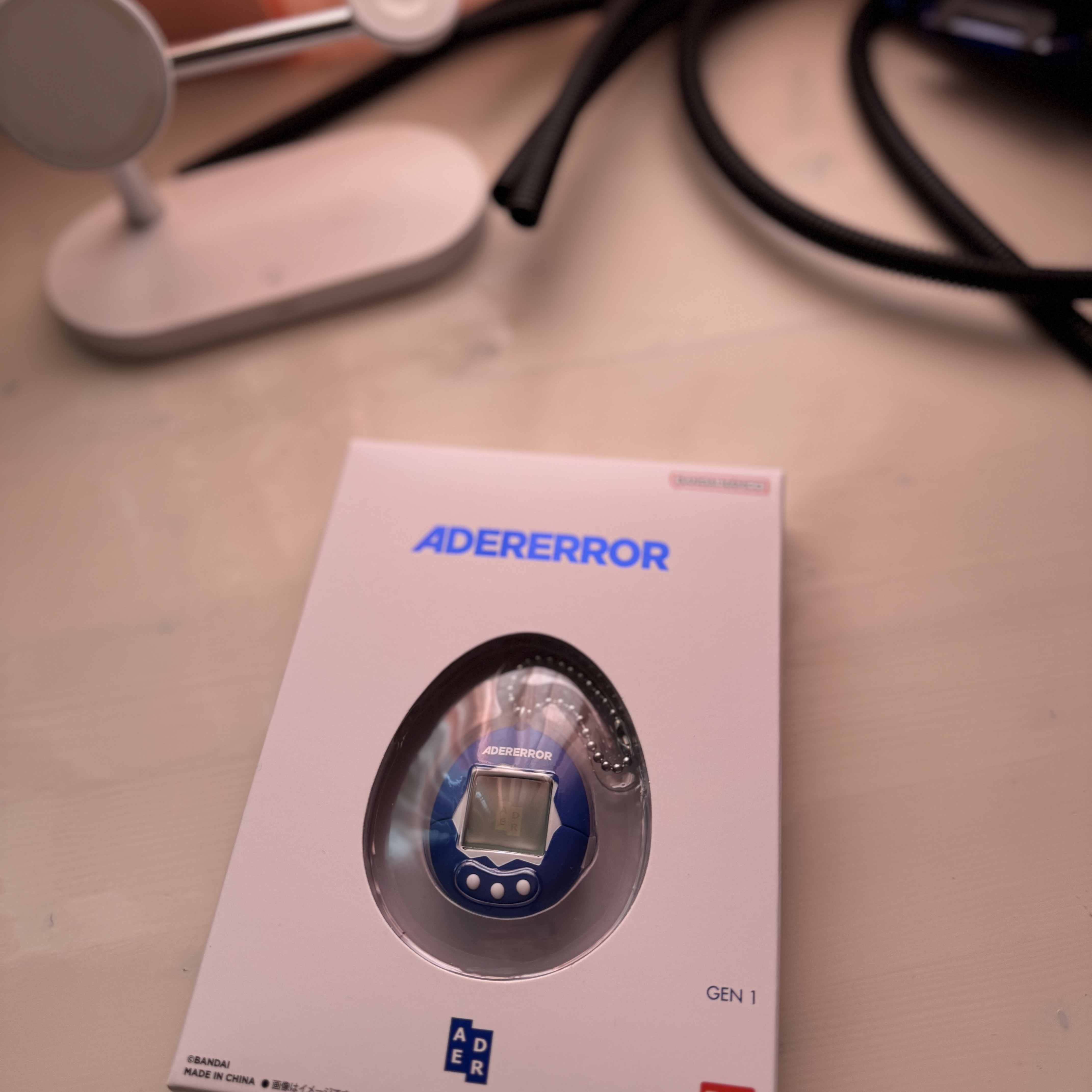Ader Error x Bandai Original Tamagotchi Z-Blue 착용 스타일