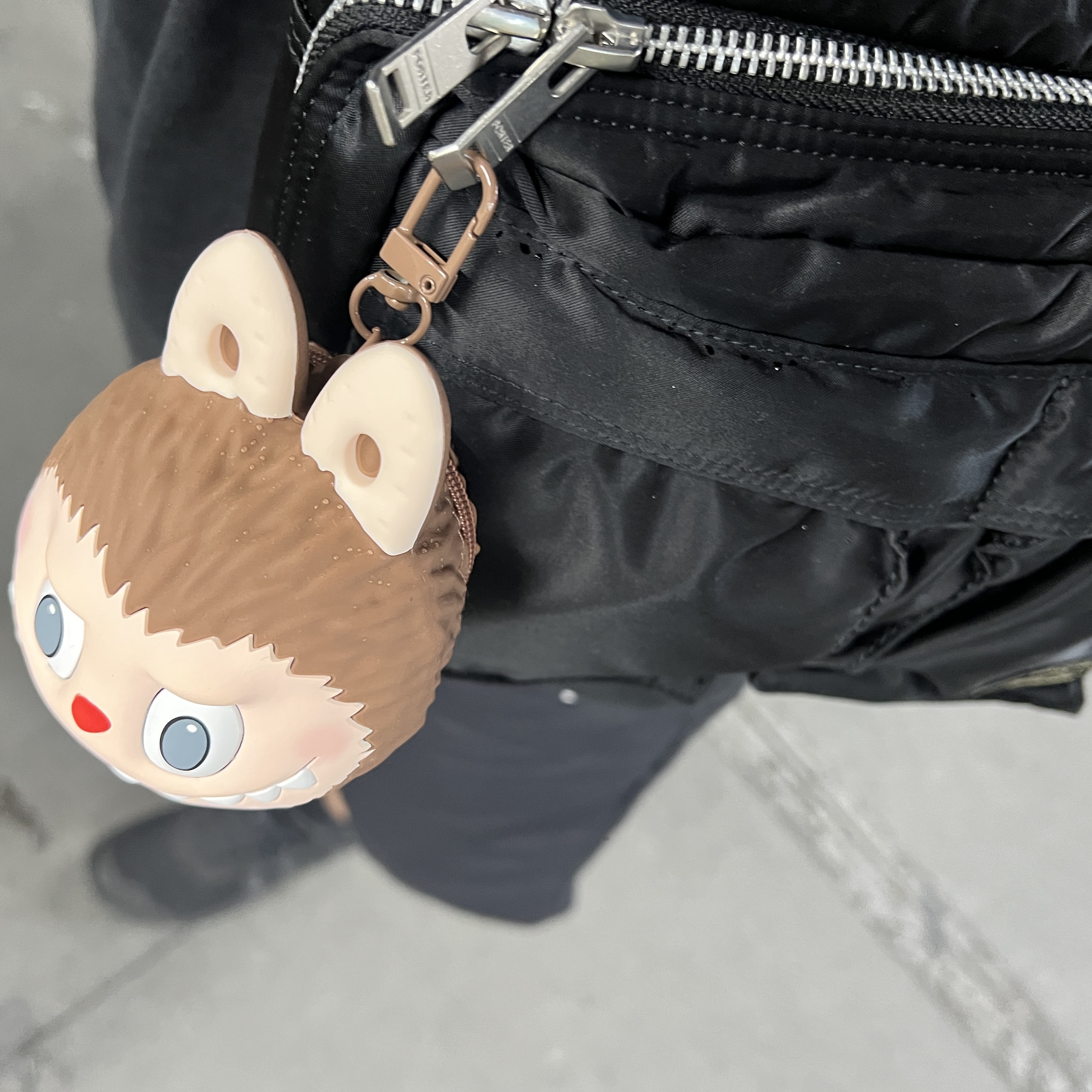 Pop Mart Labubu Original Silicone Earphone Bag Brown, Porter All New Tanker Sling Bag Zip Black 착용 스타일