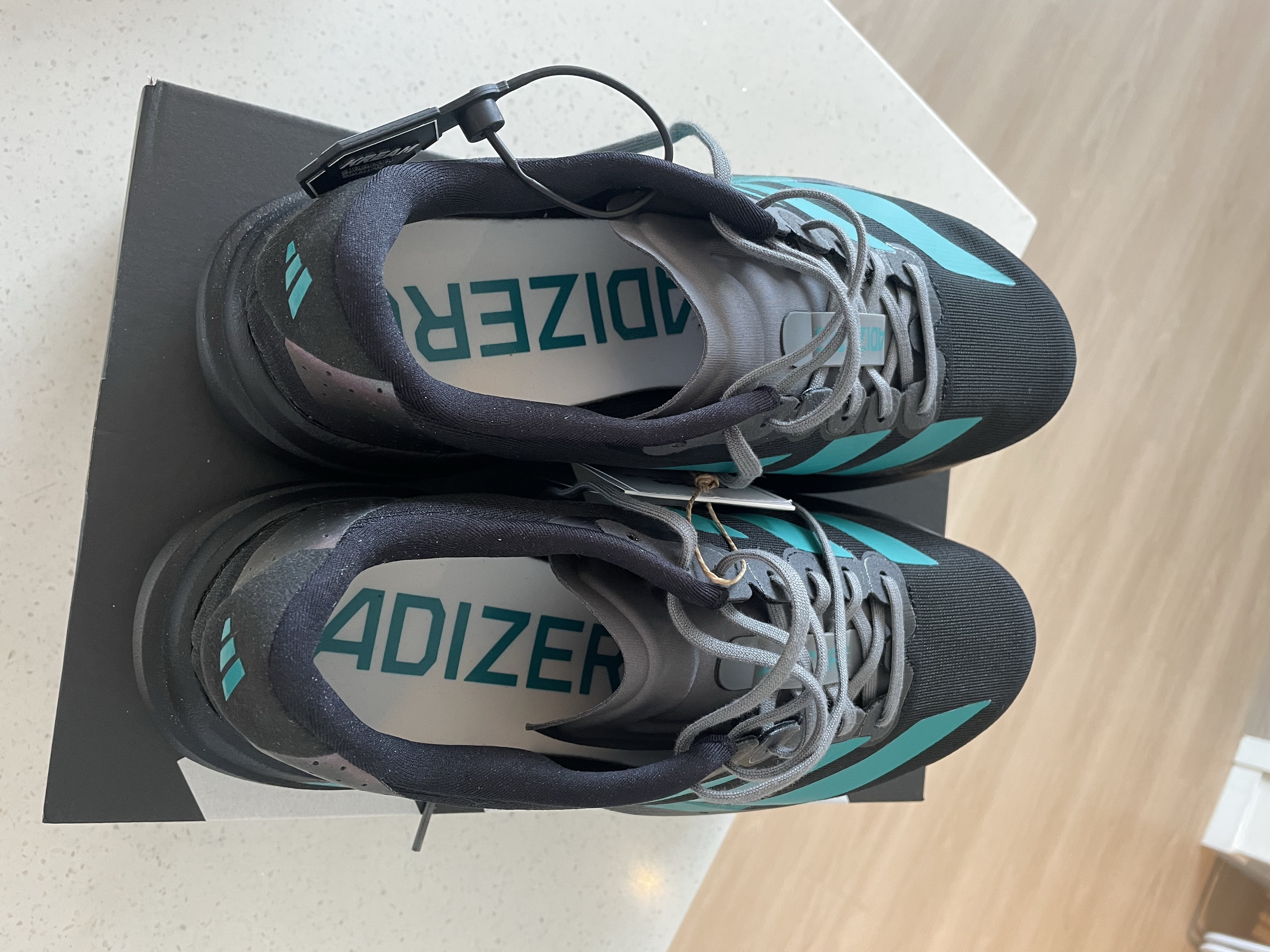 Adidas Adizero EVO SL  Core Black Pure Teal 착용 스타일 - 3