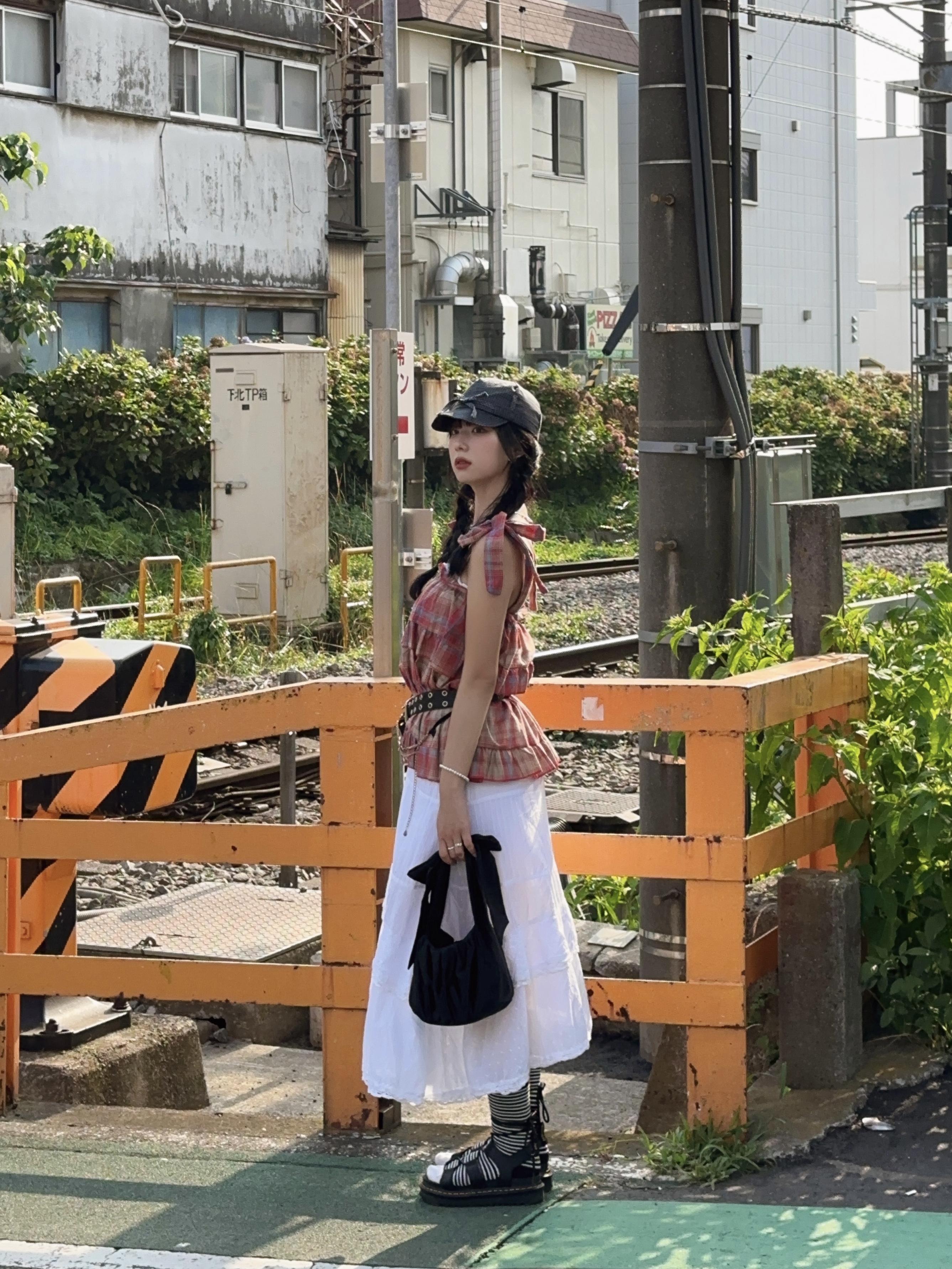 (W) Dr. Martens Nartilla Hydro Leather Sandal Black, & Other Stories Satin Bow Bag Black 착용 스타일