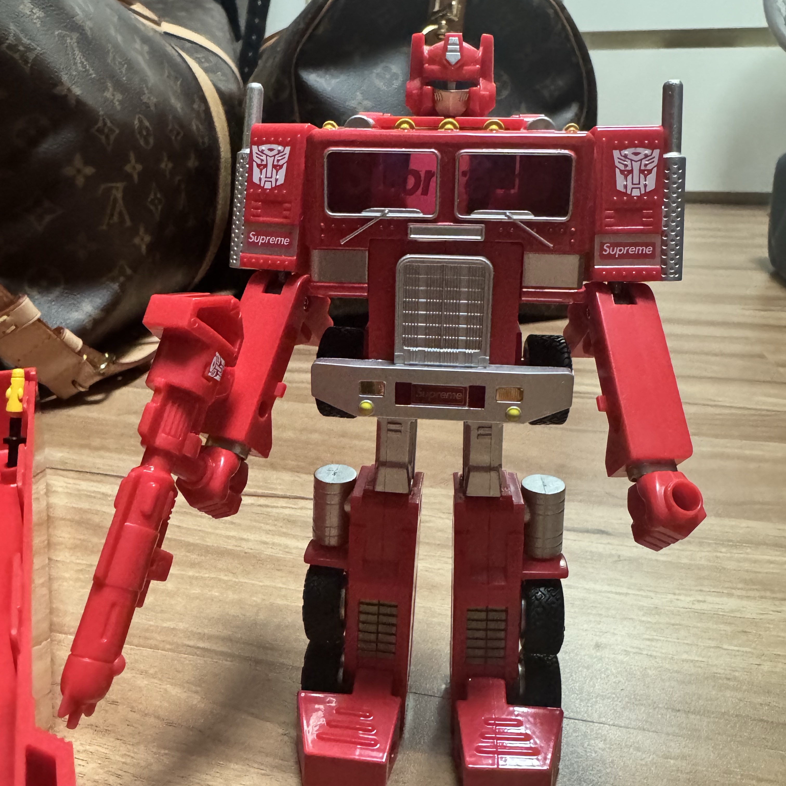 Supreme x Transformers G1 Optimus Prime Figure Red - 25SS 착용 스타일 - 2