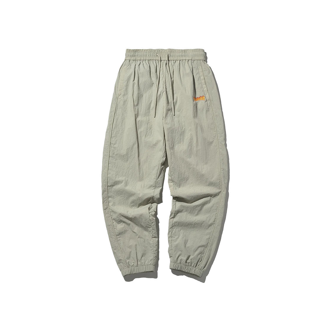 트레셔 플레임 나일론 트랙 조거 팬츠 베이지(THRASHER Flame Nylon Track Jogger Pants Beige)