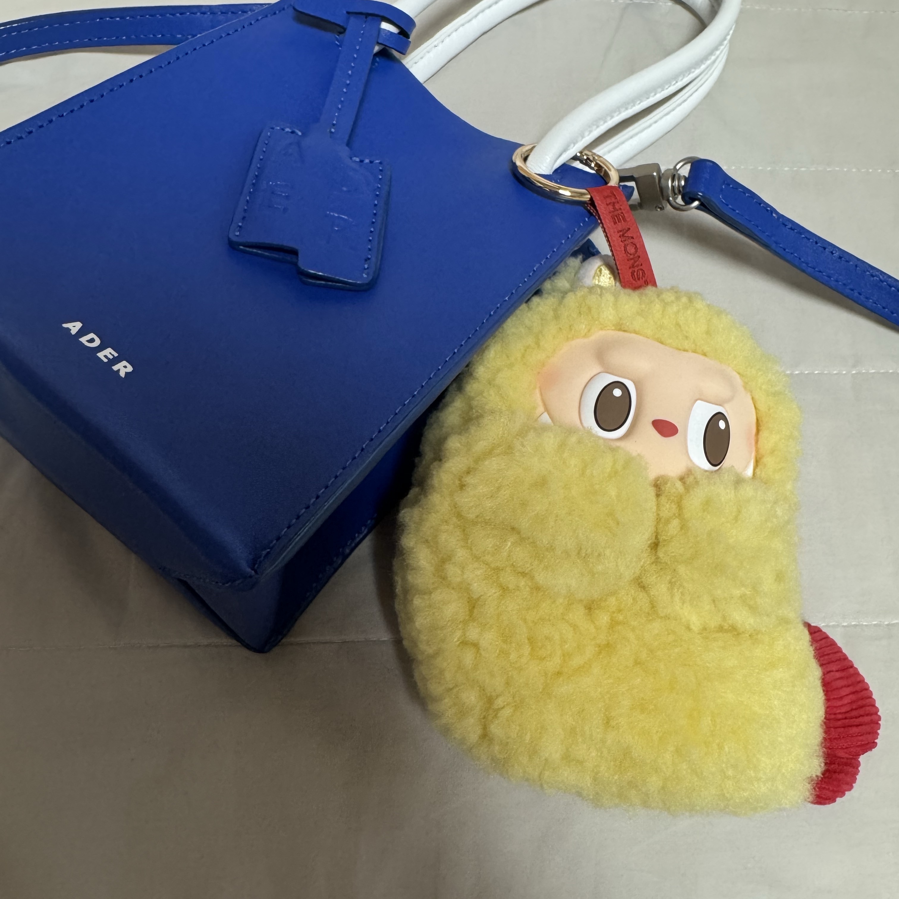 Pop Mart Labubu The Monsters Wacky Mart Series Earphone Case, Ader Error Small Shopper Bag Blue 착용 스타일