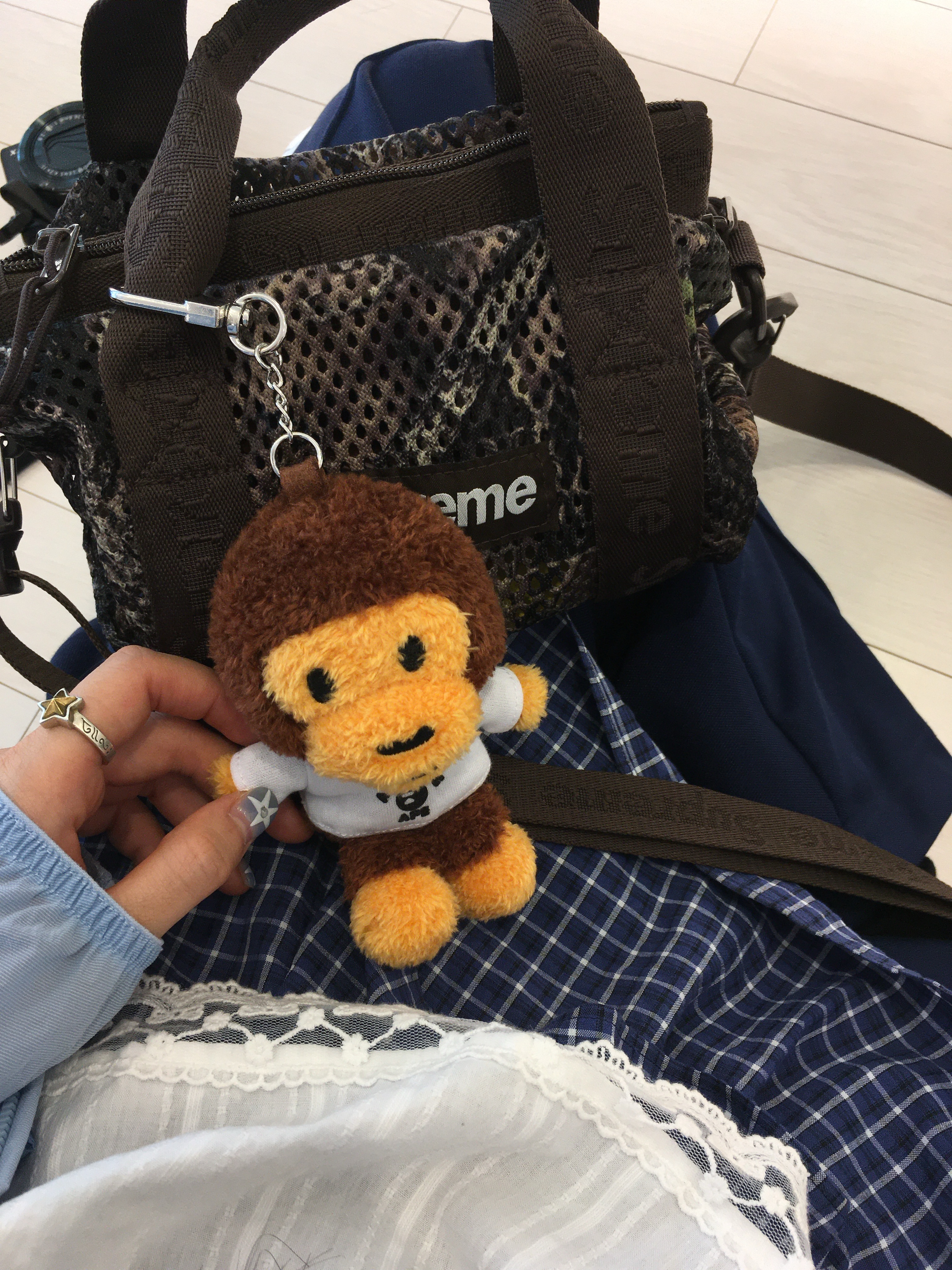 BAPE Baby Milo College T-Shirt Plush Doll Key Chain Brown, Supreme Mesh Mini Duffle Bag Truetimber Kanati Camo - 25SS 착용 스타일