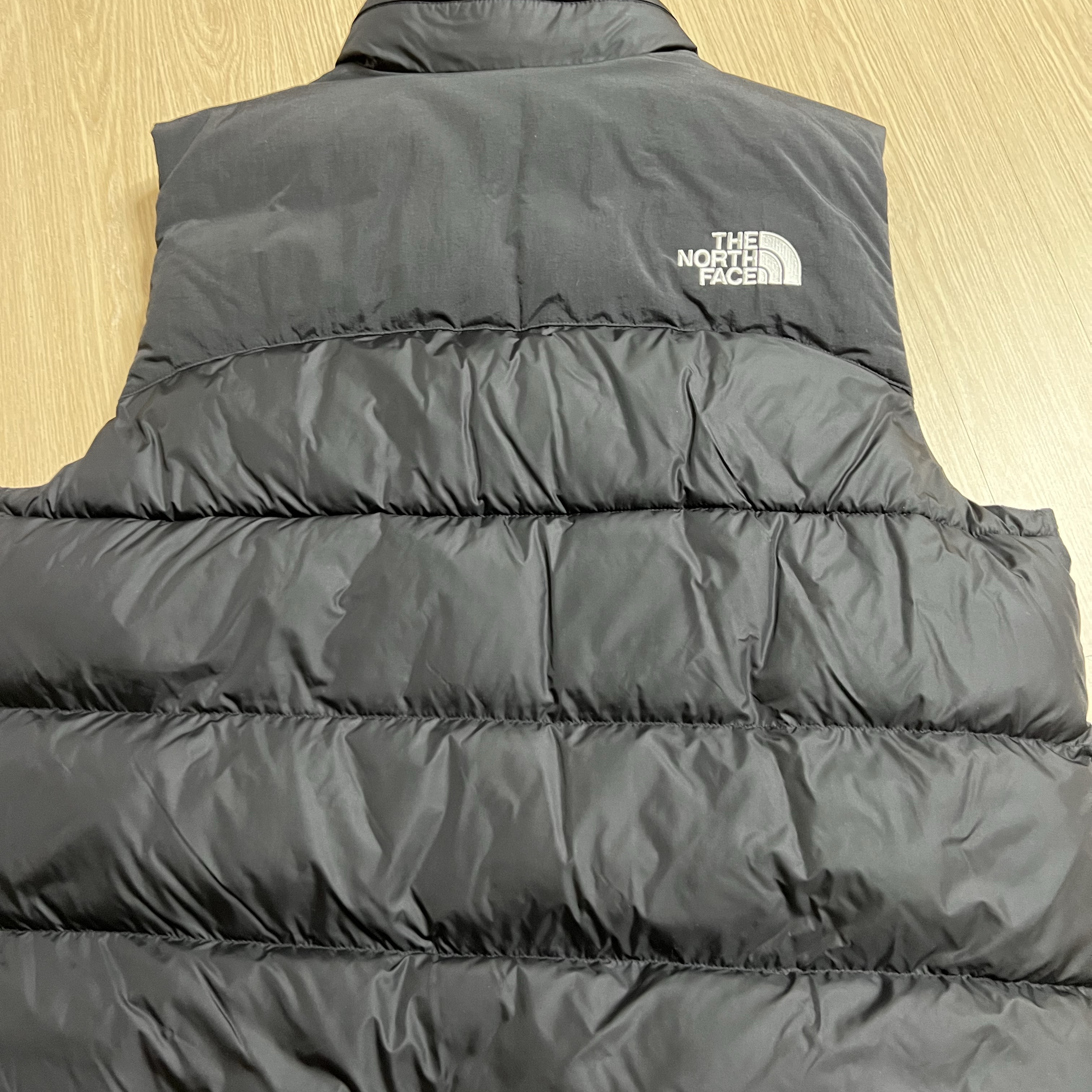 The North Face New Puffy Vest Black ์ฐฉ์ฉ ์คํ์ผ