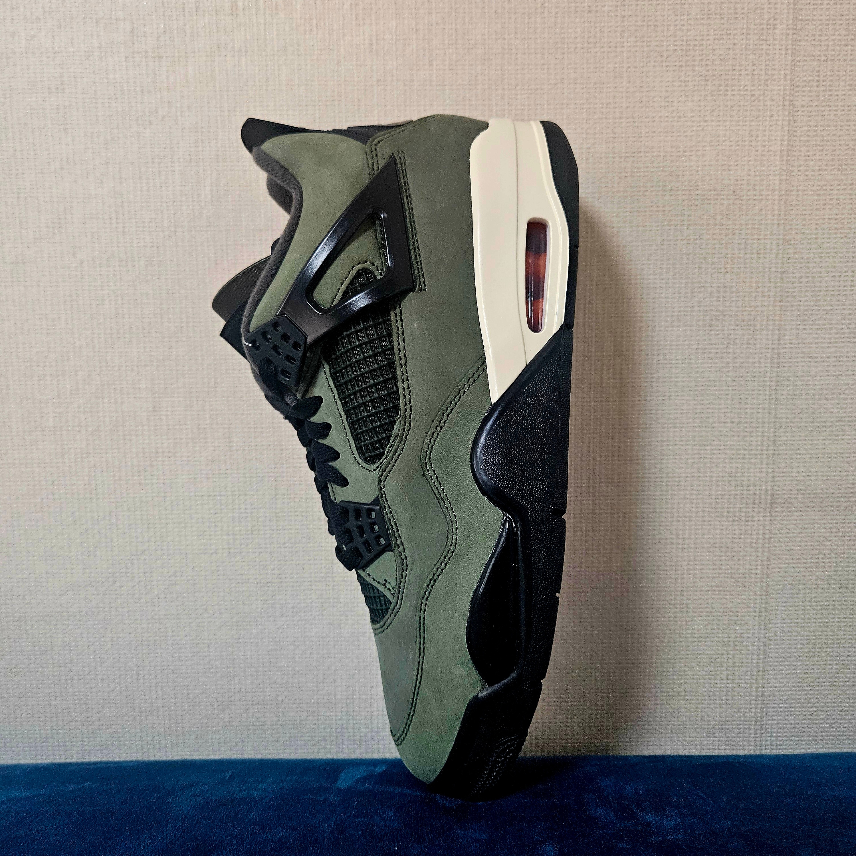 Jordan 4 x Undefeated Retro OG SP Deep Green and Clementine 착용 스타일