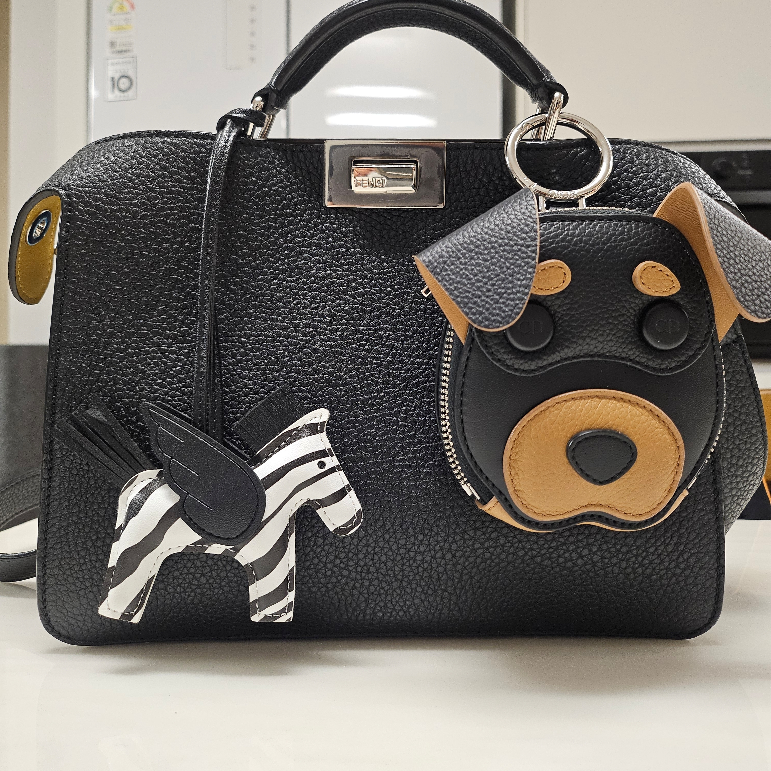 Dior Mini Bobby Zipped Pouch Grained and Smooth Calfskin Brown Black, Fendi Peekaboo I See U Leather Bag Brown 착용 스타일 - 1