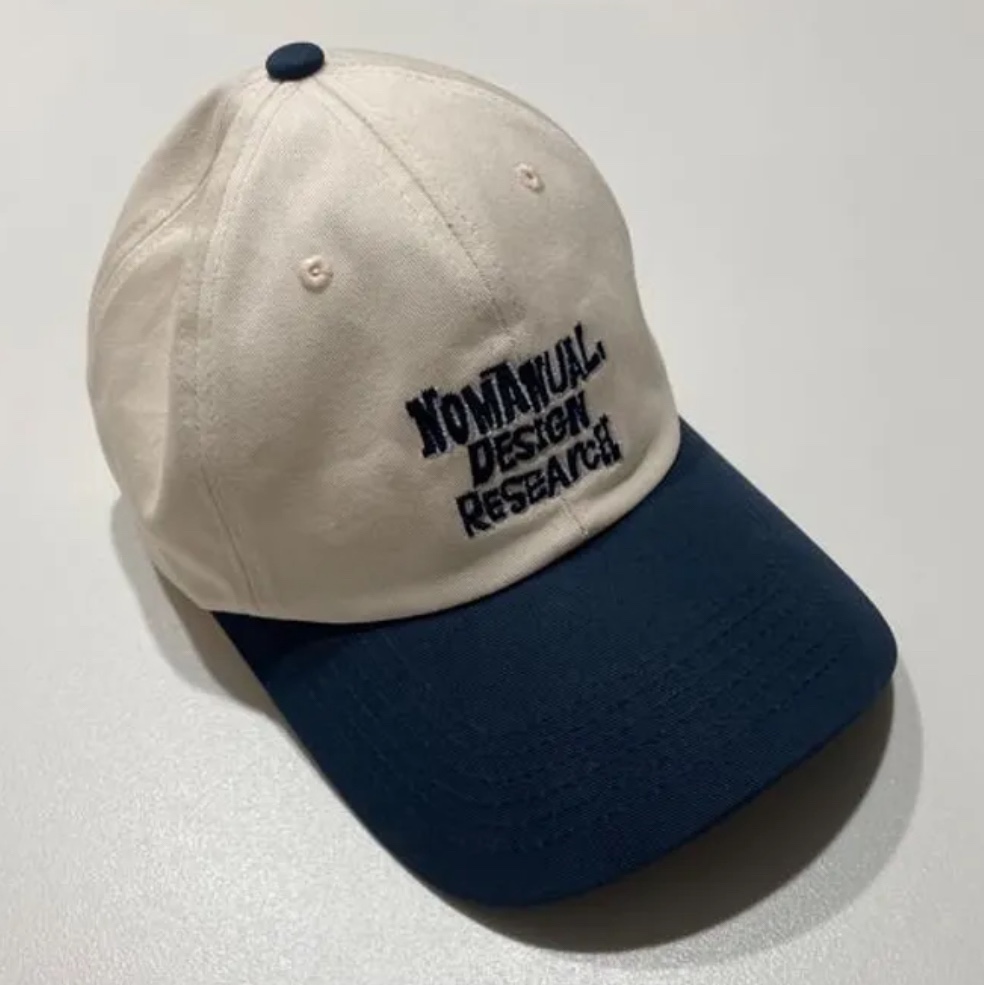 NOMANUAL Doodle Ball Cap Dark Navy 착용 스타일