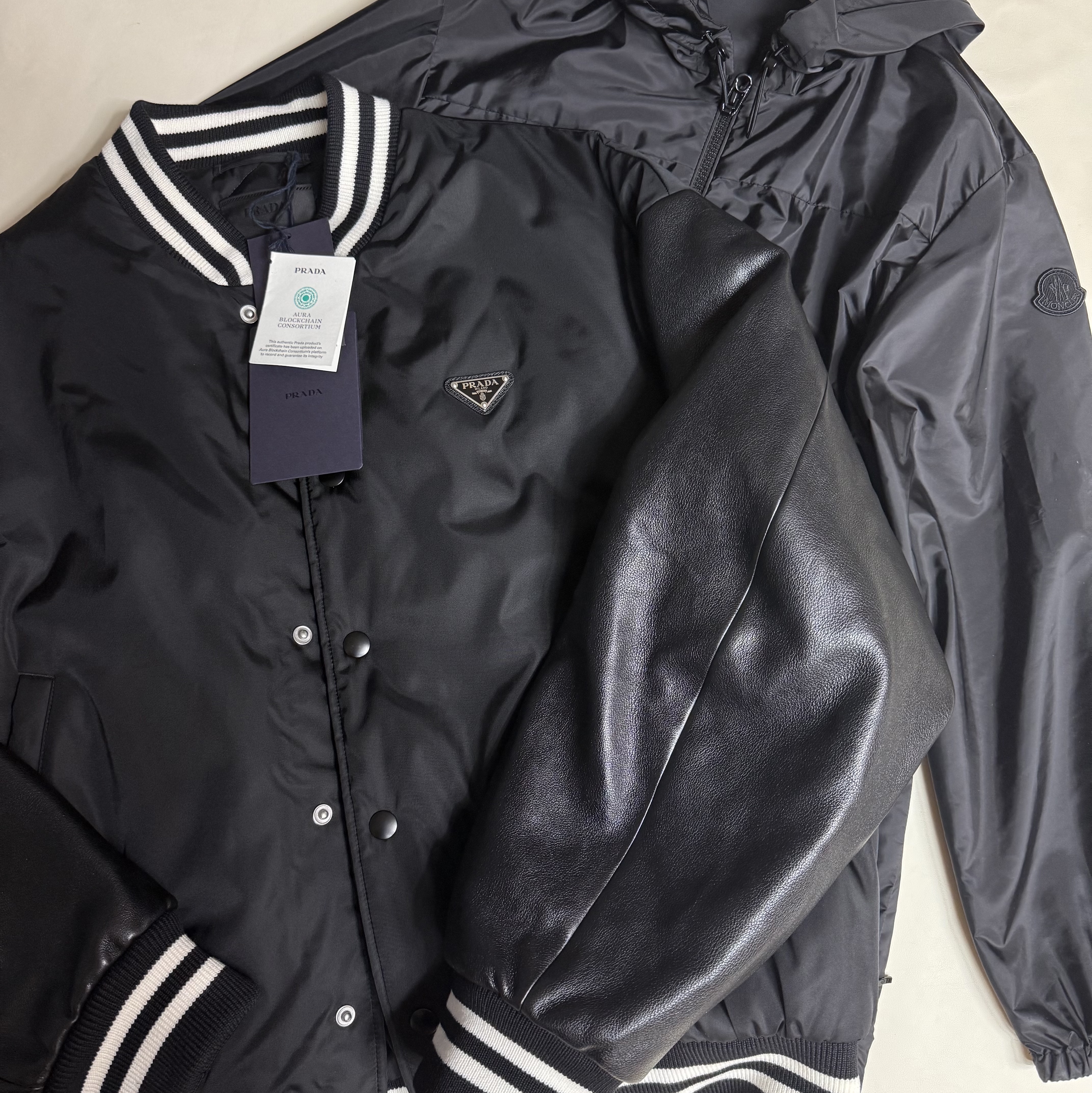 Prada Oversized Re-Nylon Bomber Jacket Black, (W) Moncler Filira Hooded Jacket Black - 24SS 착용 스타일