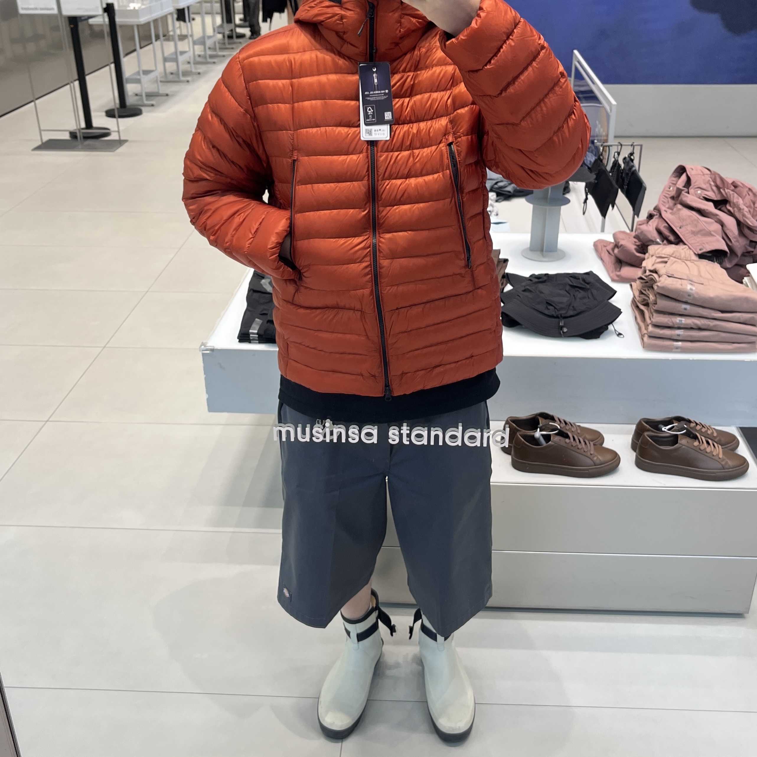 Musinsa Standard City Leisure Sheer Ripstop Hooded Light Down Jacket Orange 착용 스타일