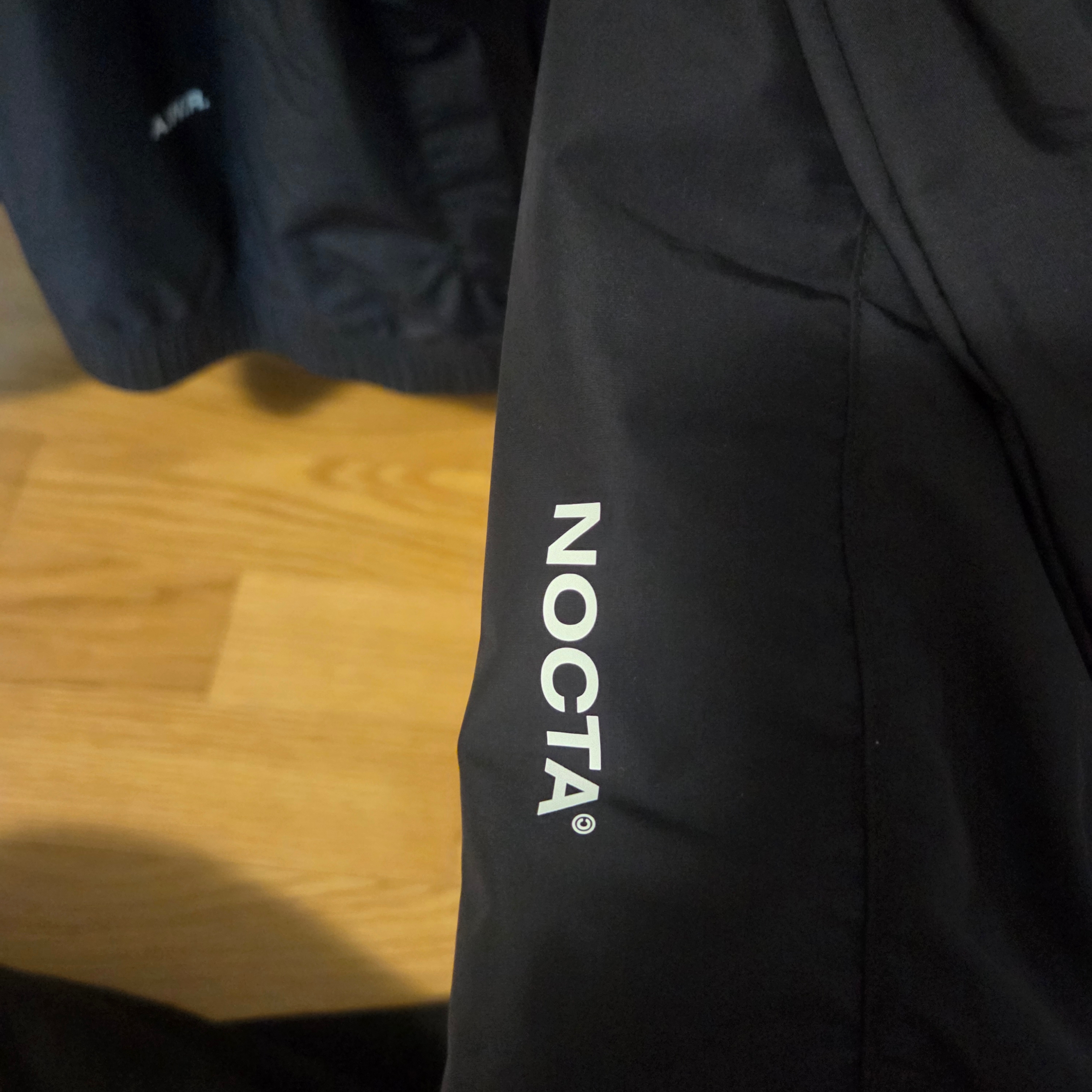 Nike x Drake Nocta Nylon Track Jacket Black (FN7666-010) 착용 스타일 - 5