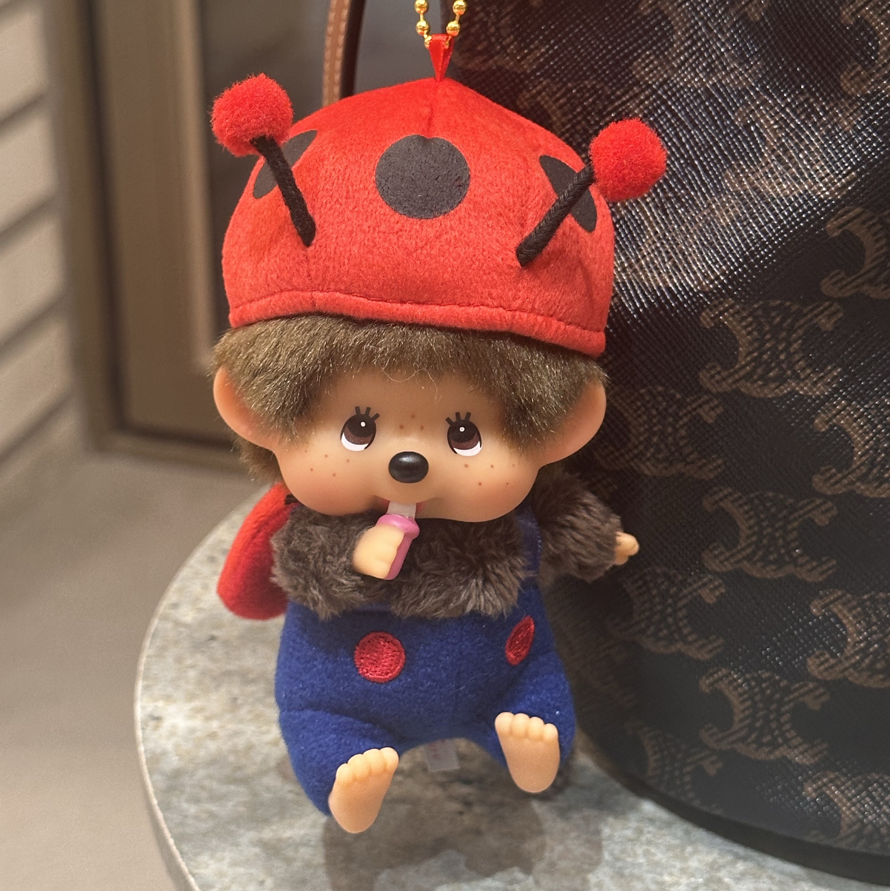 Monchhichi Bighead SS Ladybug Key Chain, Celine Teen Clara Bag in Triomphe Canvas and Calfskin Tan 착용 스타일 - 1
