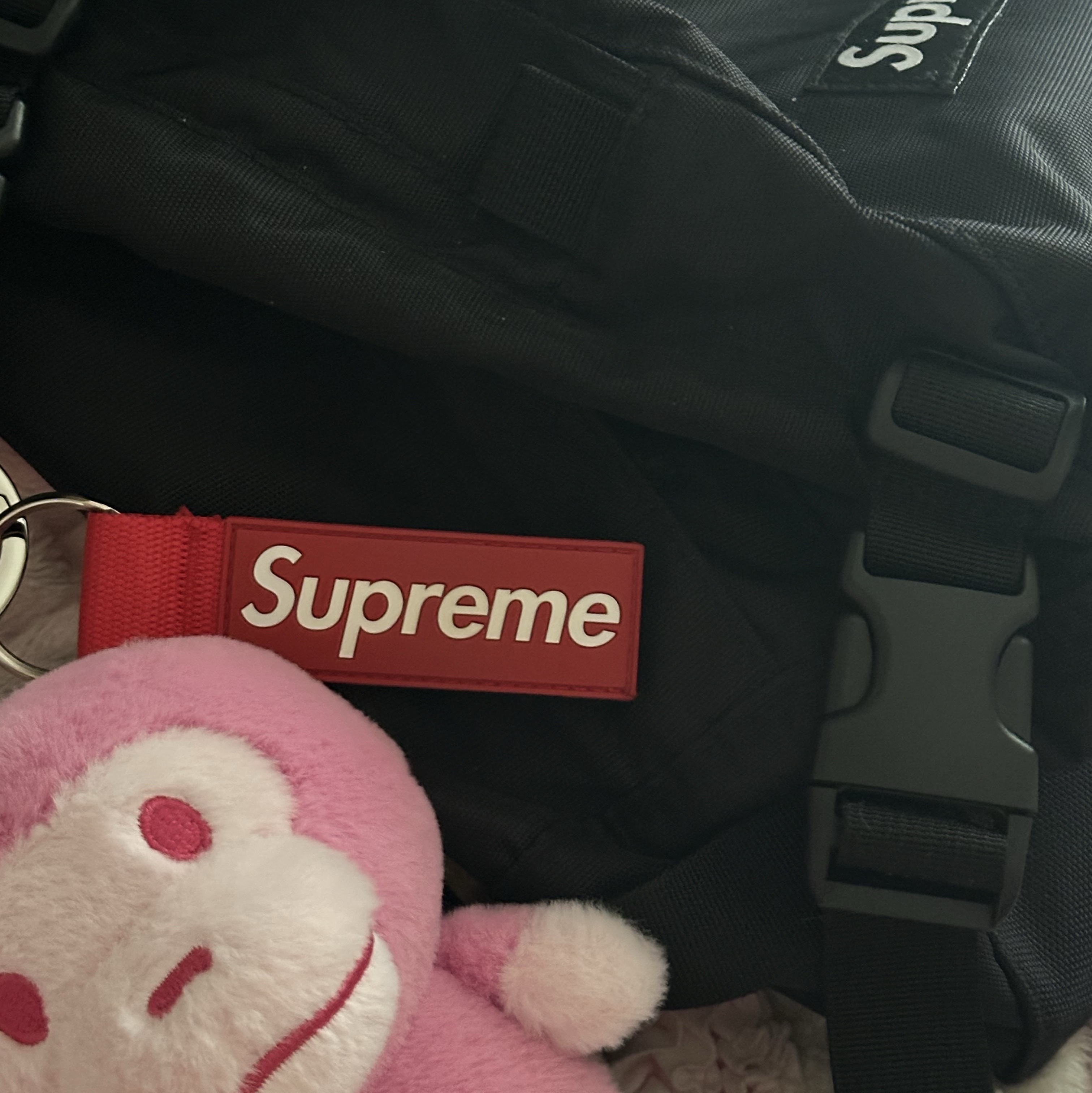 BAPE Baby Milo Plush Doll Keychain Light Pink, Supreme Webbing Keychain Red - 23SS 착용 스타일