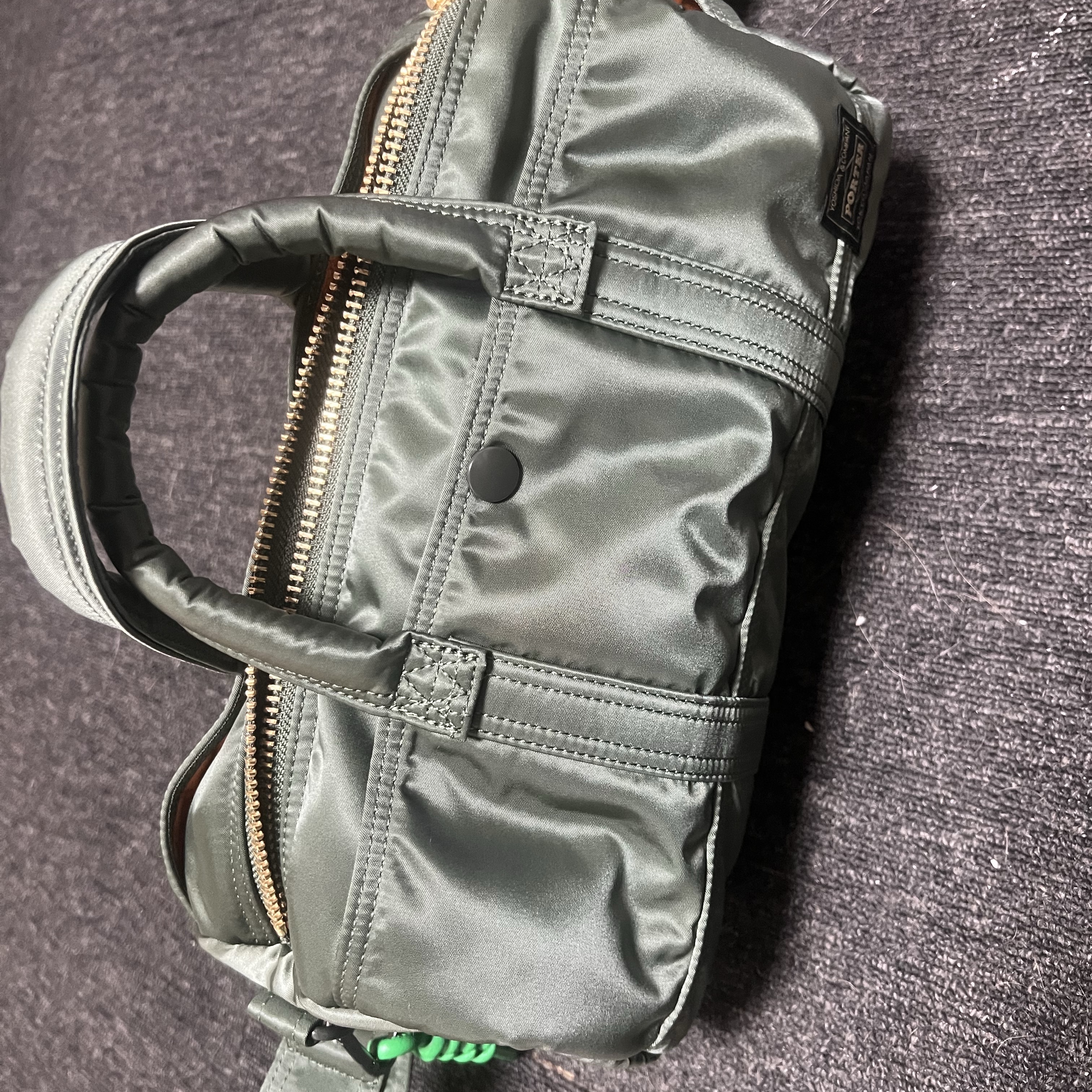 Porter All New Tanker Roll Bag Sage Green 착용 스타일