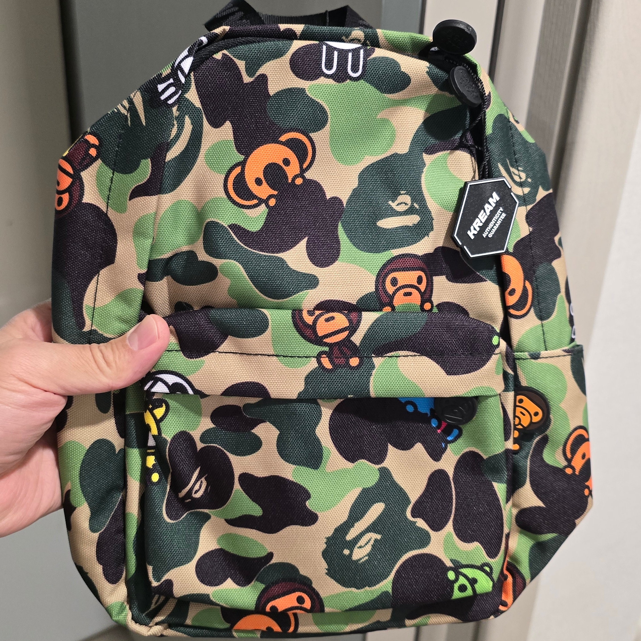 BAPE ABC Milo All Friends Mini Backpack Green 착용 스타일