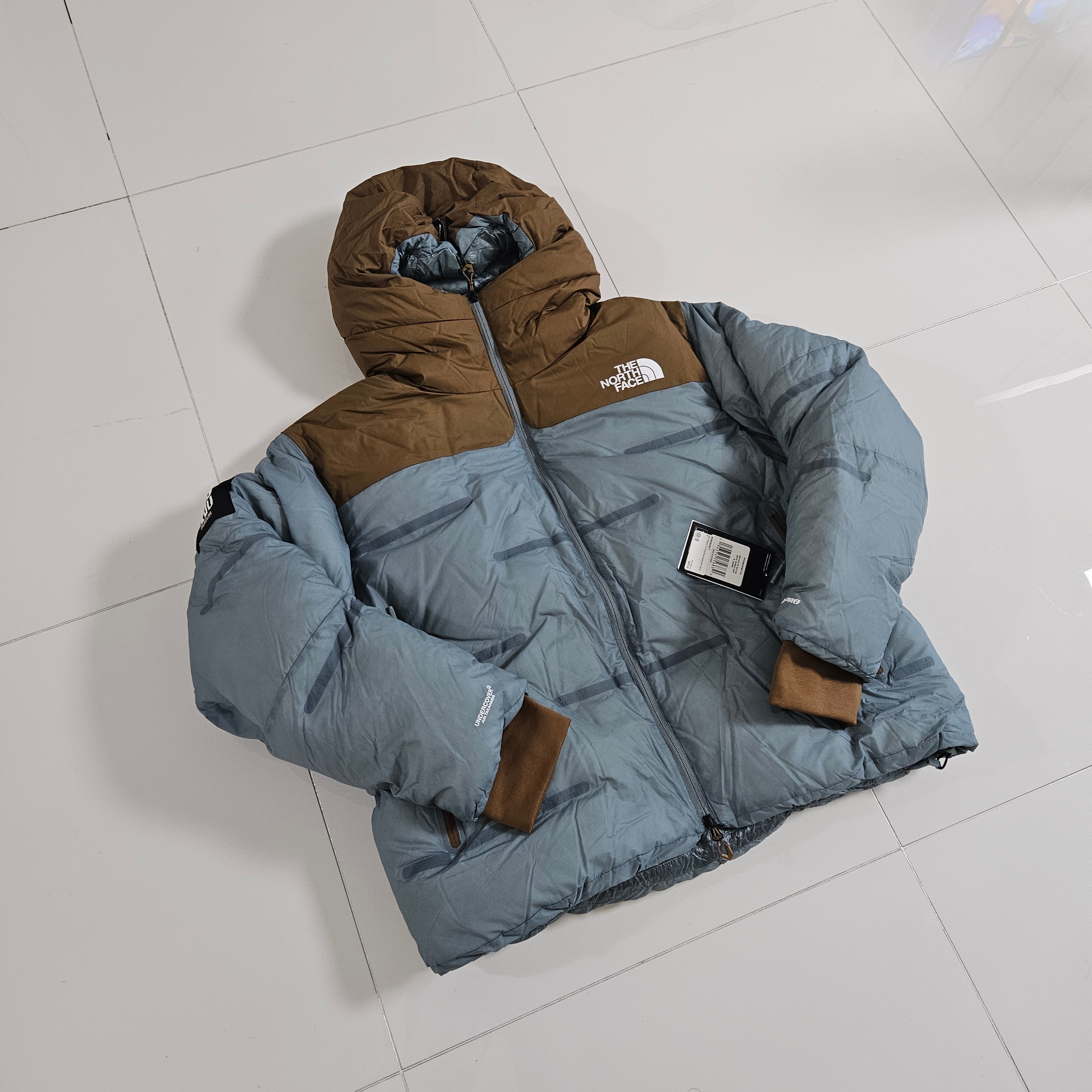 The North Face x Undercover Soukuu Cloud Down Nupste Sepia Brown Concrete Grey 착용 스타일