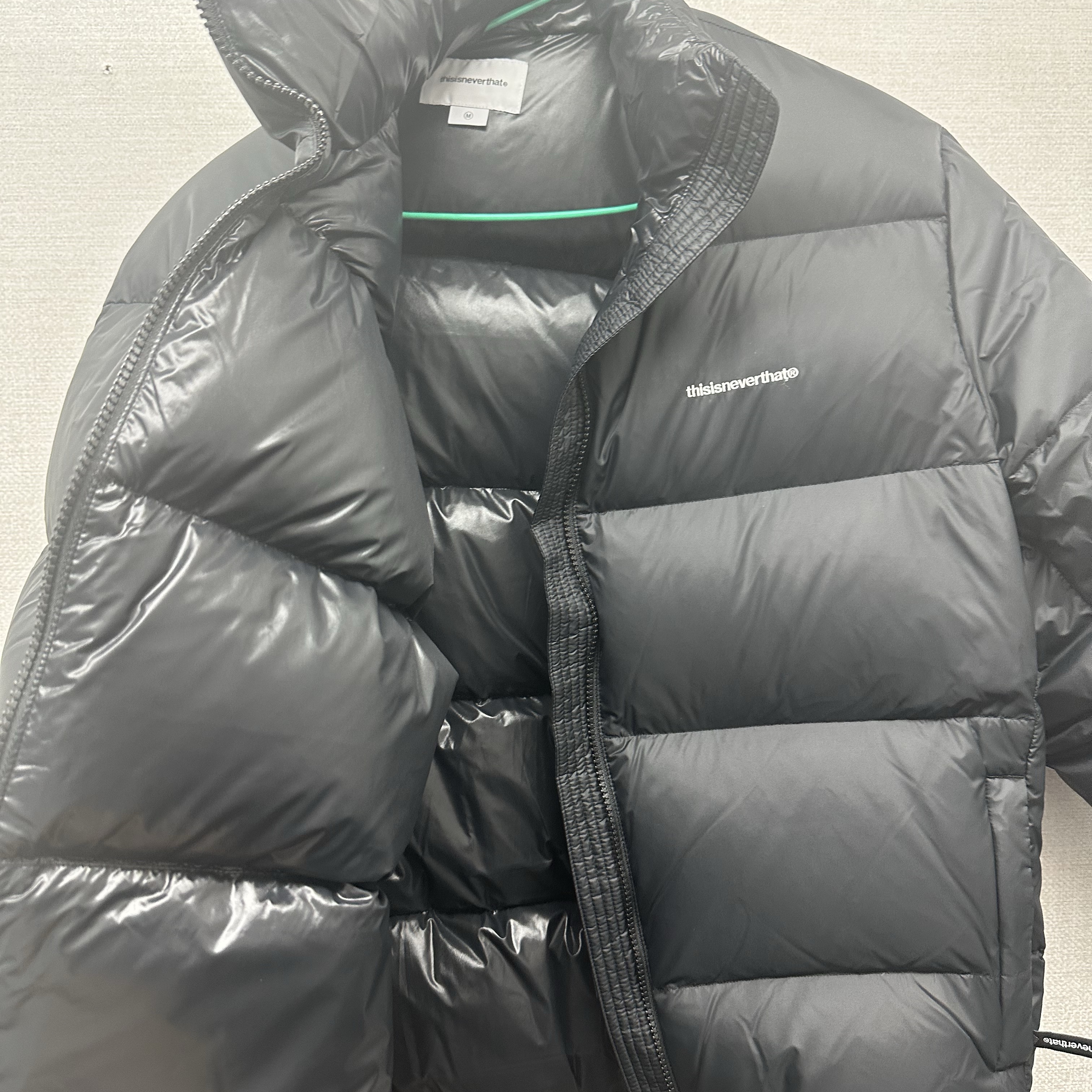 Thisisneverthat Pertex T Down Jacket Black 착용 스타일