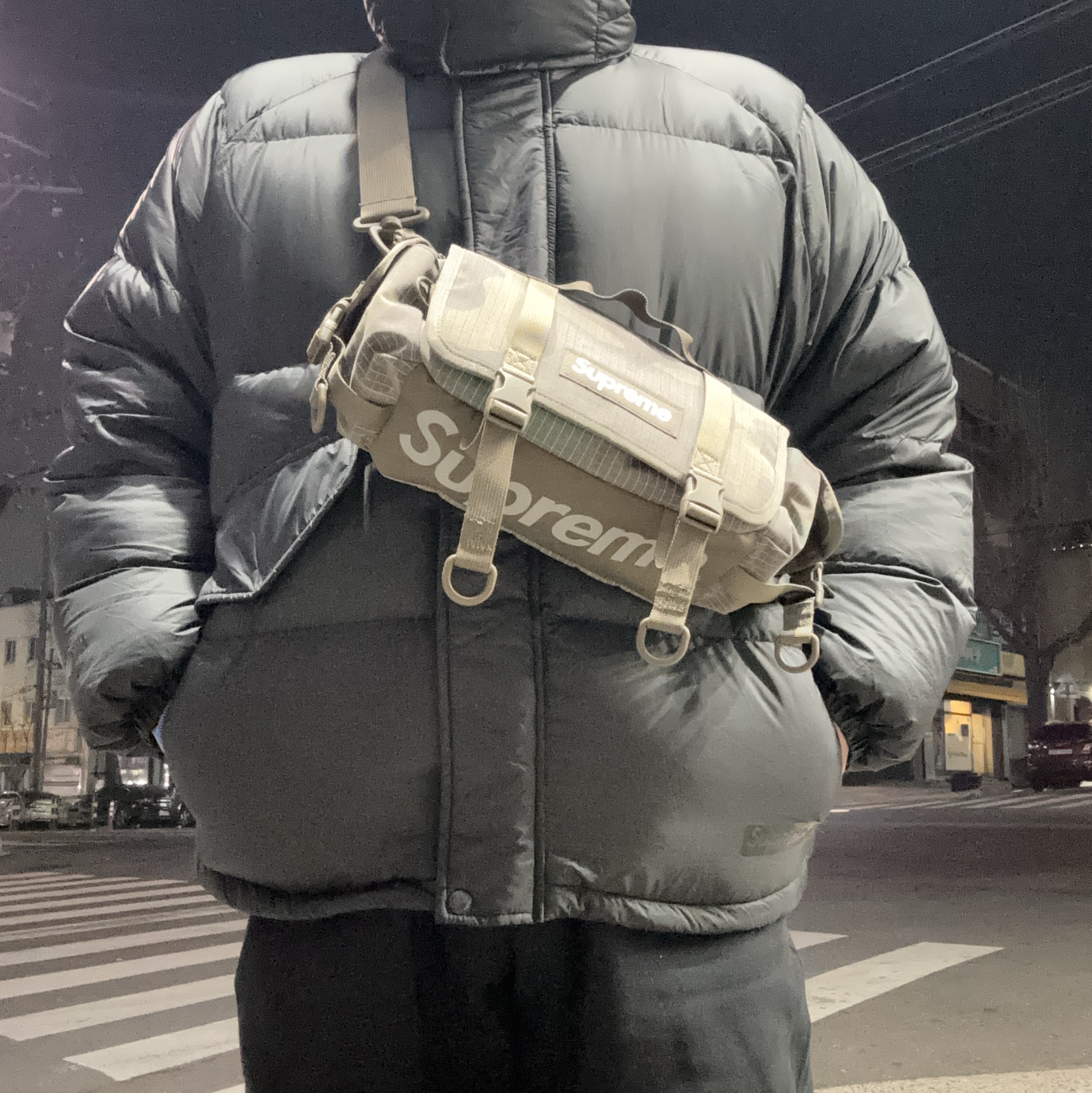 Supreme 700-Fill Down Lightweight Puffer Jacket Black - 24FW, Supreme Mini Duffle Bag Woodland Camo - 24SS 착용 스타일