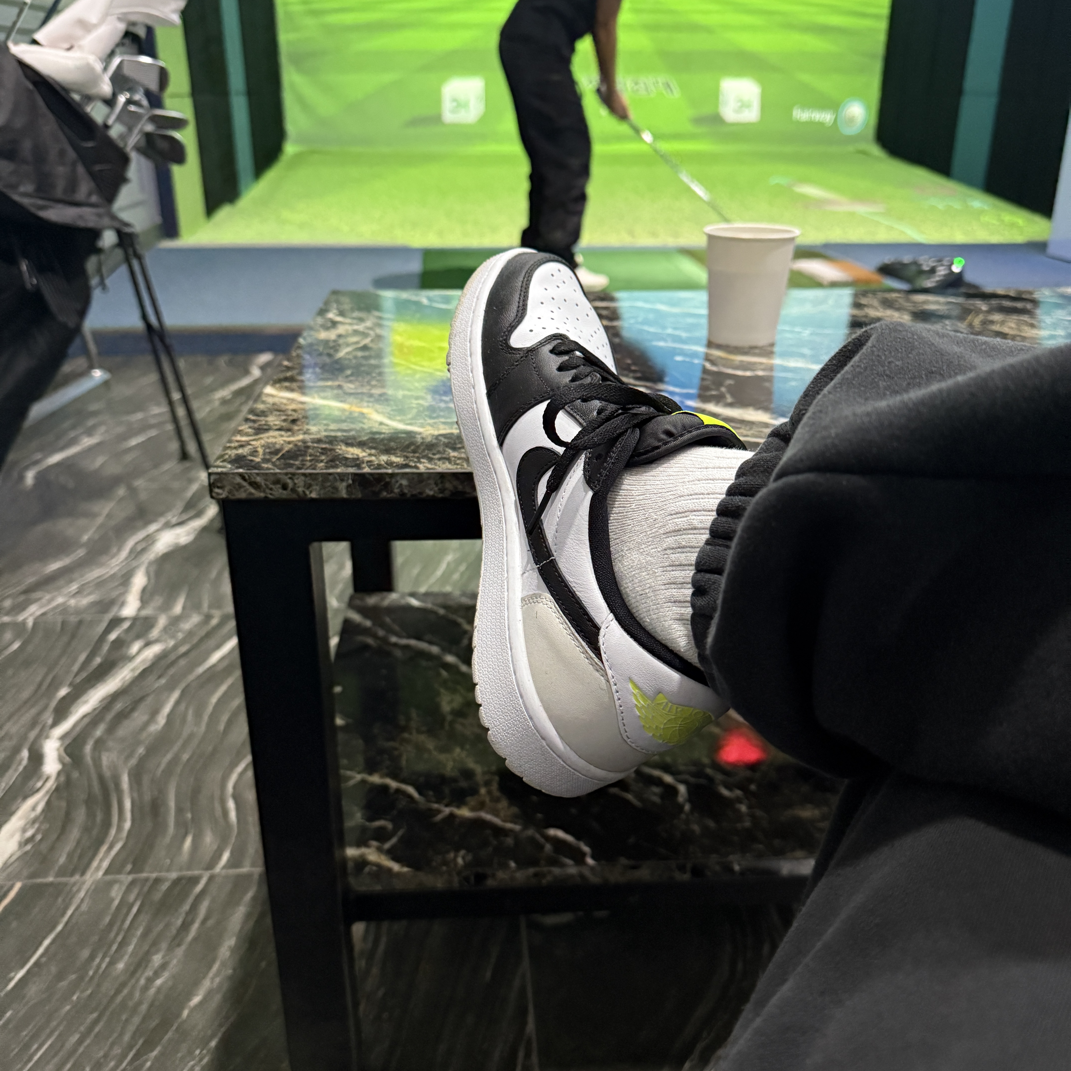 Jordan 1 Low Golf Black White and Volt 착용 스타일