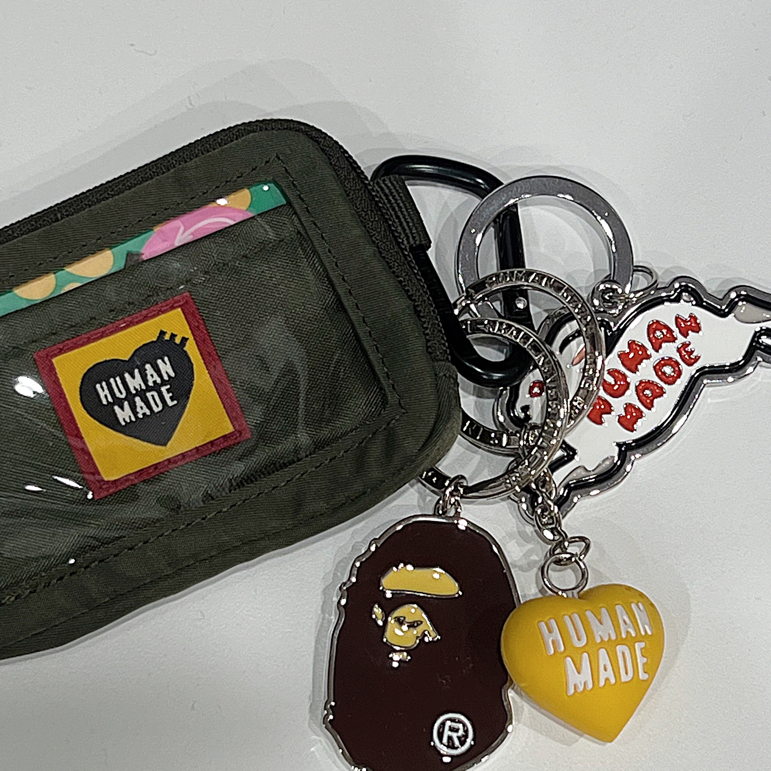 BAPE Ape Head Metal Keychain Brown, Human Made Heart Rubber Key Chain Yellow 착용 스타일