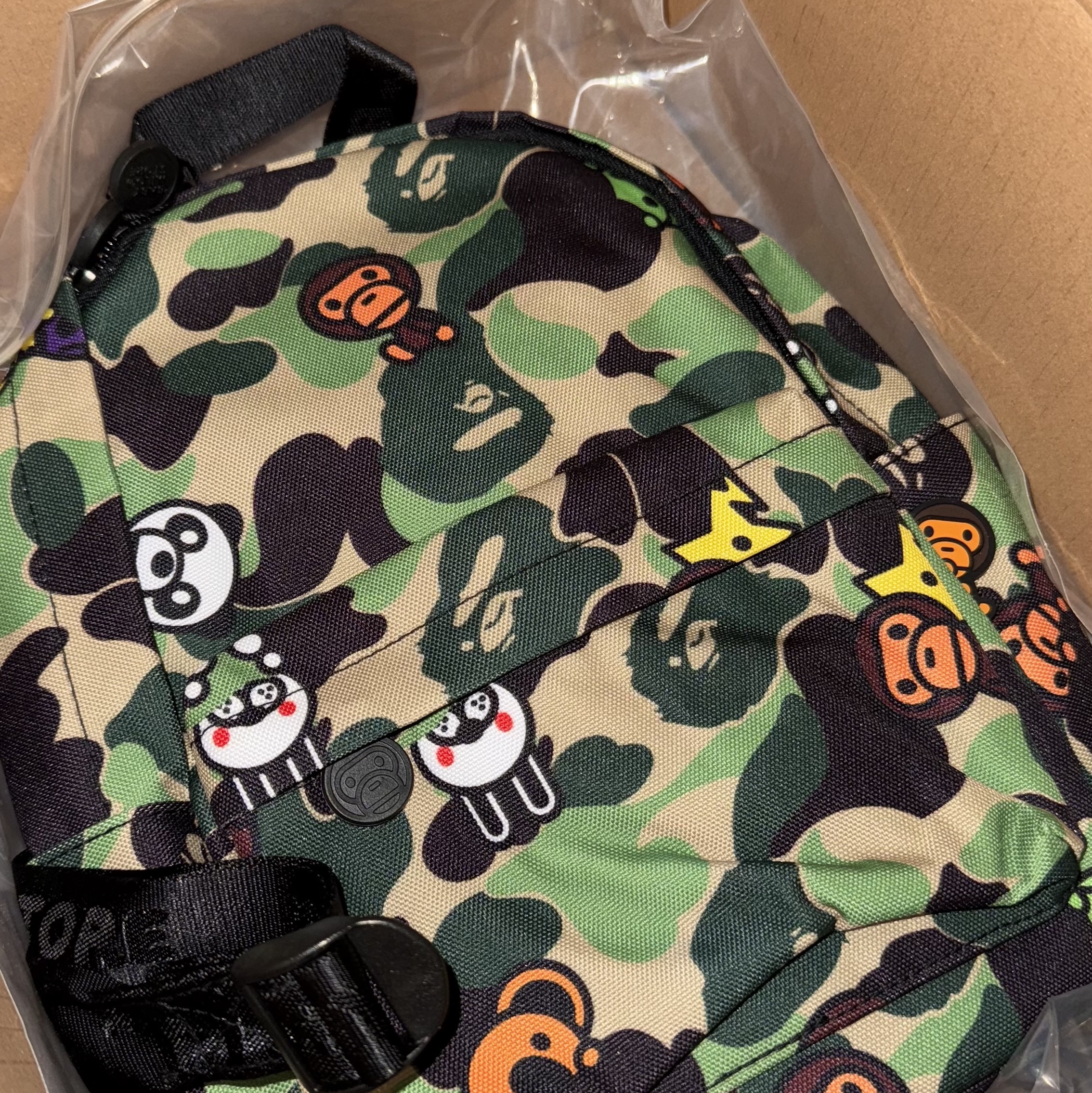 BAPE ABC Milo All Friends Mini Backpack Green 착용 스타일
