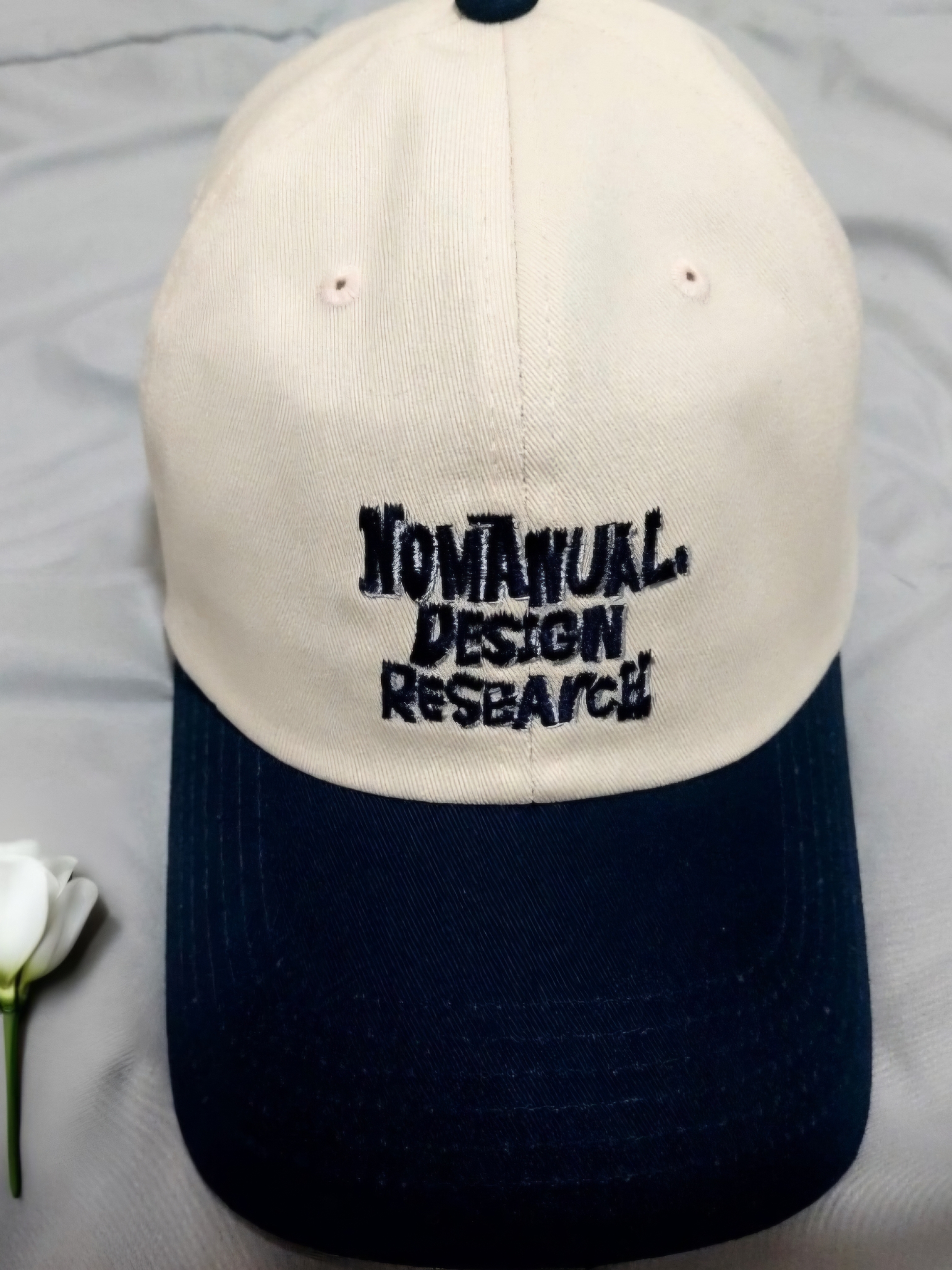 NOMANUAL Doodle Ball Cap Dark Navy 착용 스타일