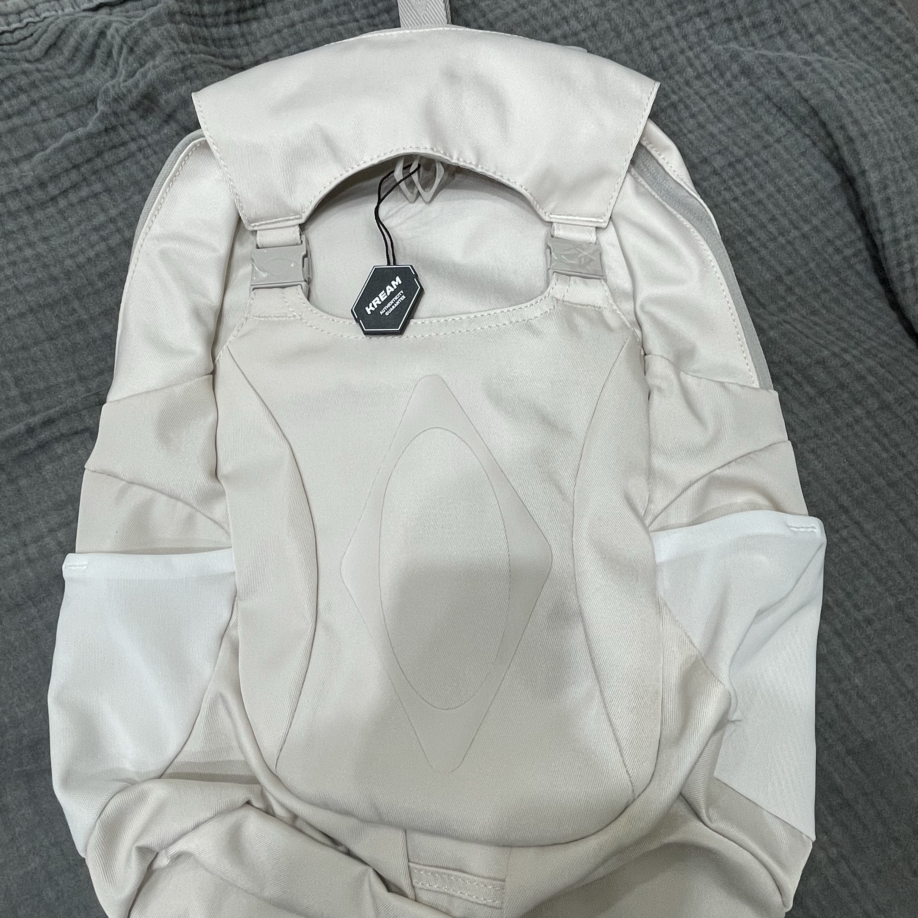 Mischief Buckle Flap Backpack Light Beige 착용 스타일