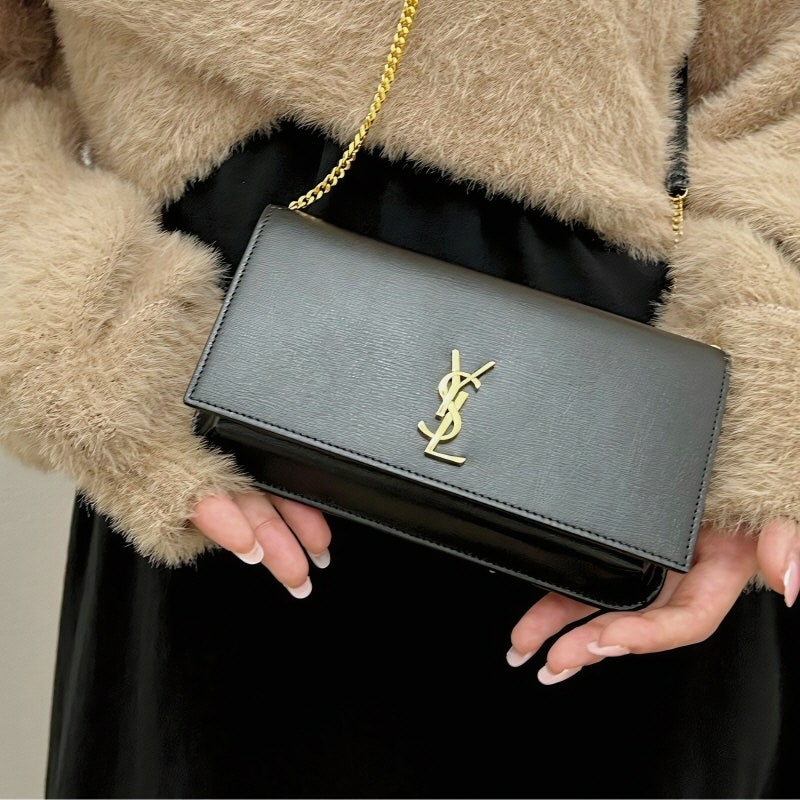 Saint Laurent Gold Monogram Phone Holder with Strap in Smooth Leather Black 착용 스타일 - 1