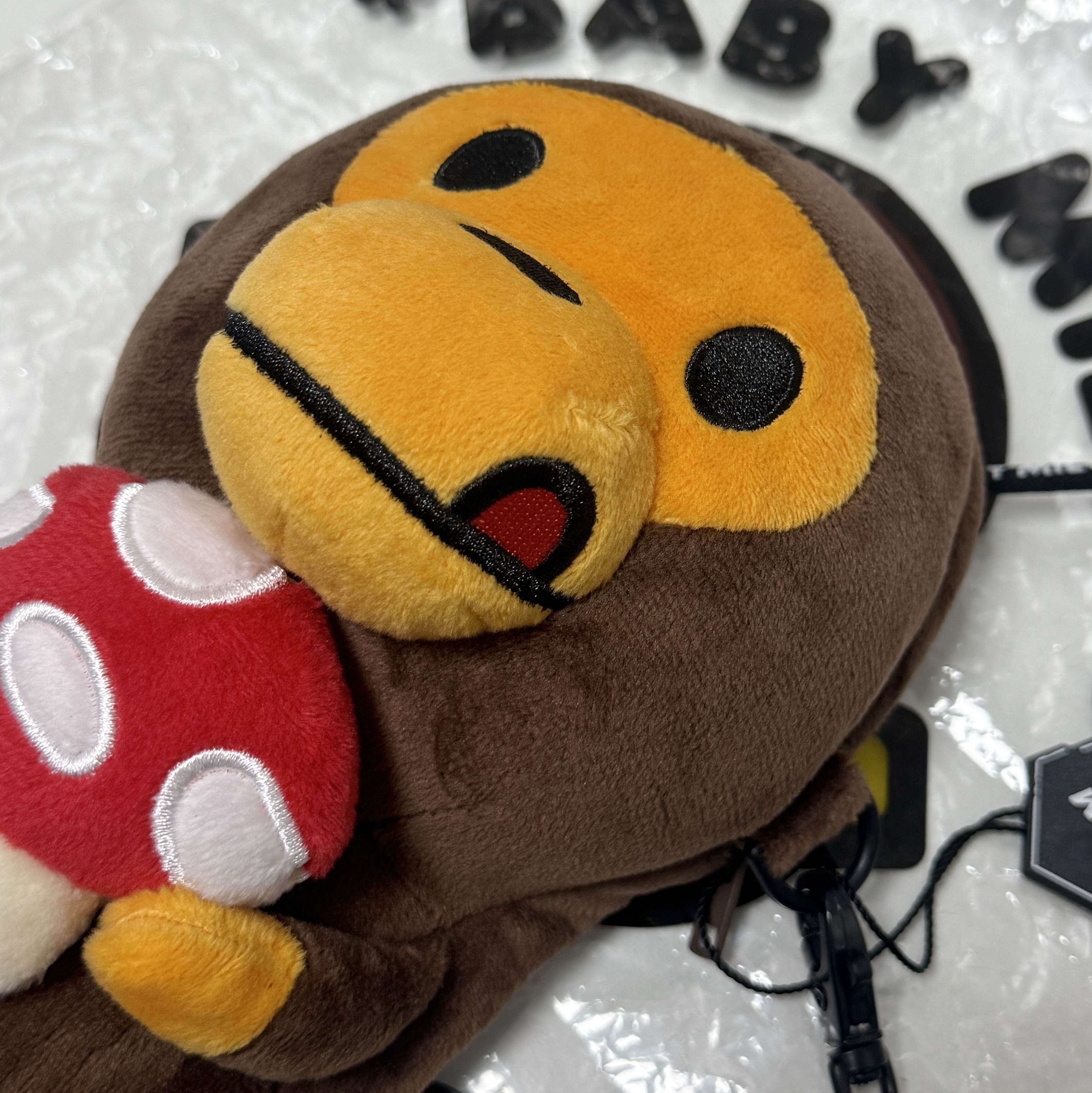 BAPE Baby Milo Plush Mobile Bag Brown 착용 스타일