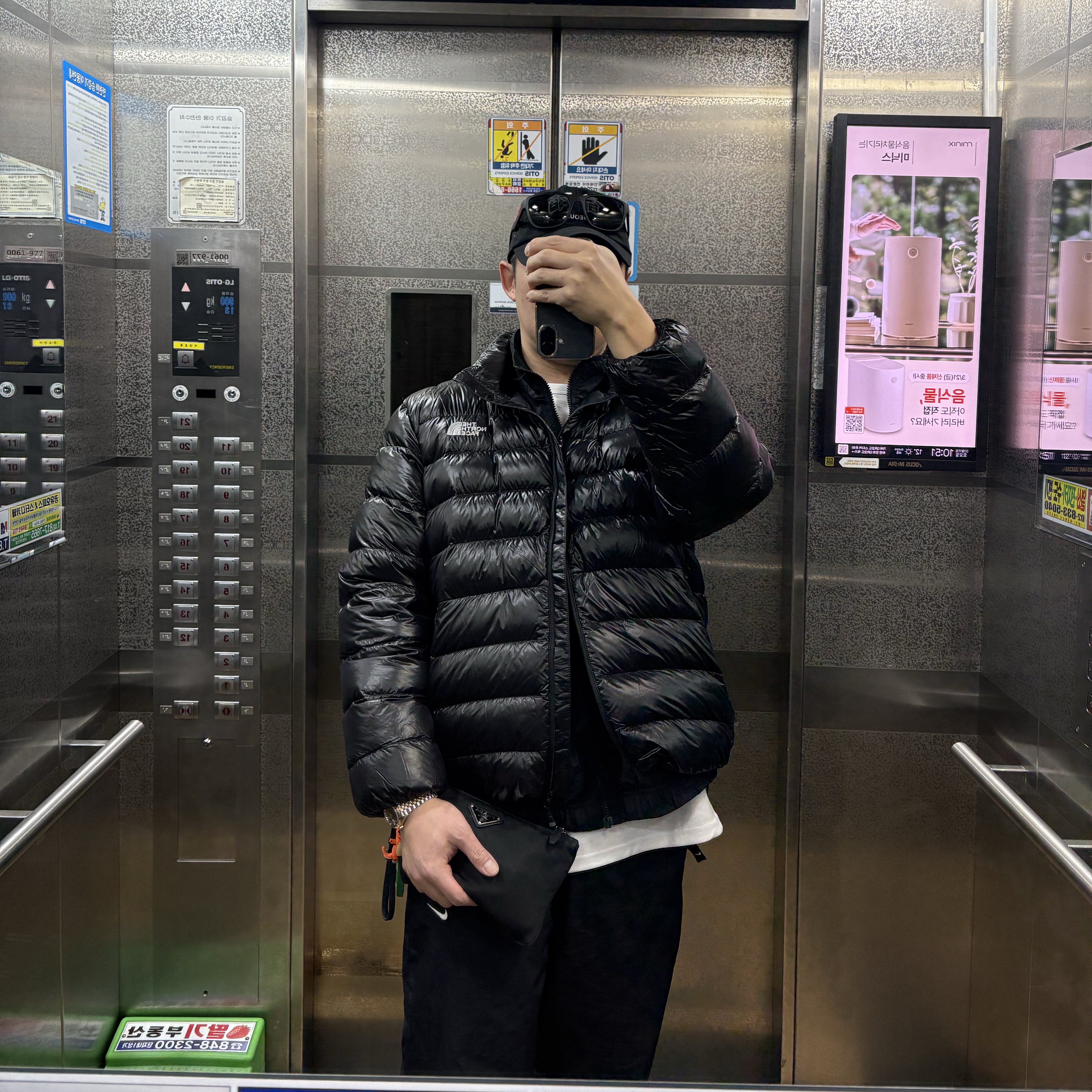 The North Face Matier RDS Down Jacket Black - 24FW, Prada Re-Nylon and Saffiano Leather Pouch Black 착용 스타일