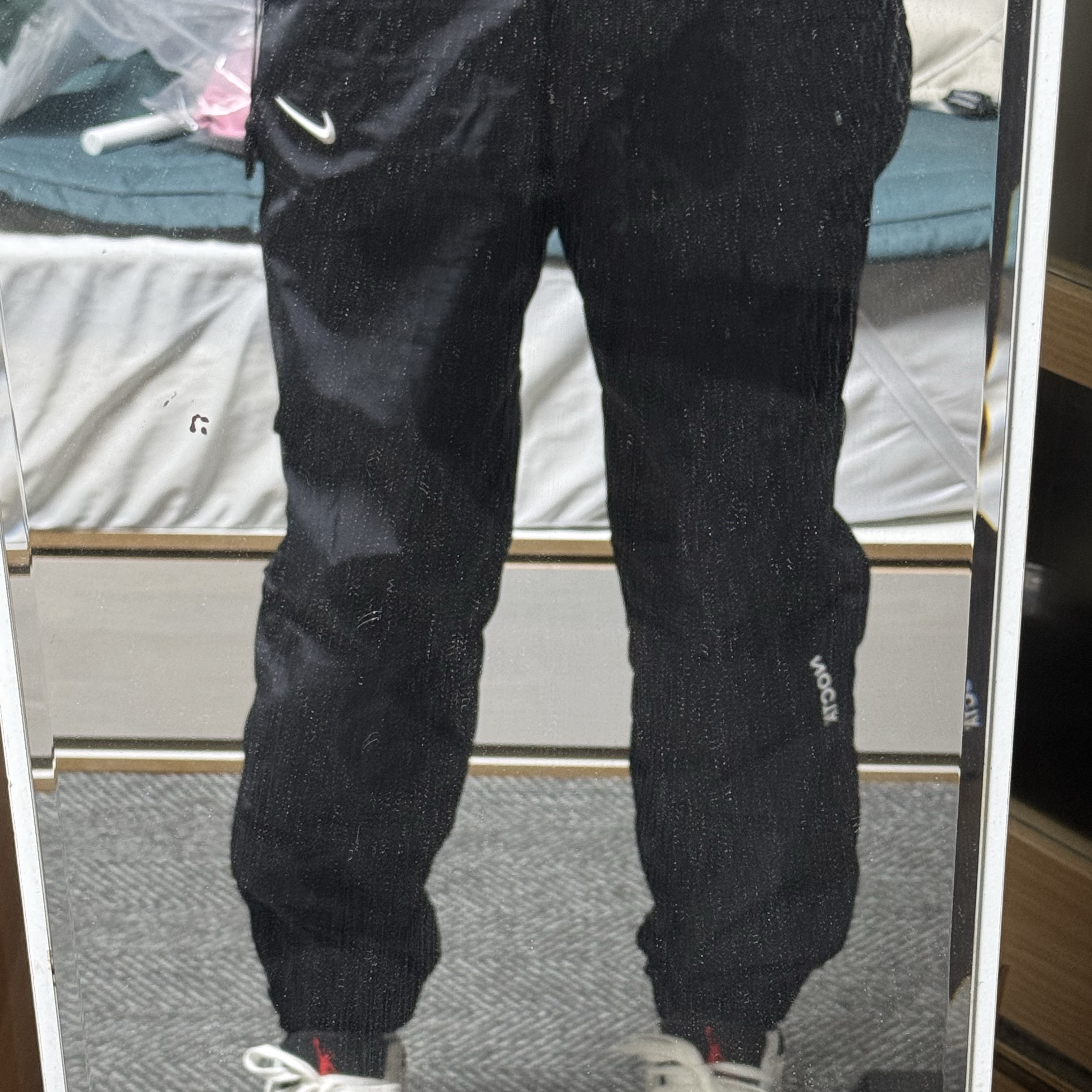 Nike x Drake Nocta Woven Track Pants Black (FN7668-010), Jordan x Travis Scott Jumpman Jack TR University Red 착용 스타일 - 2
