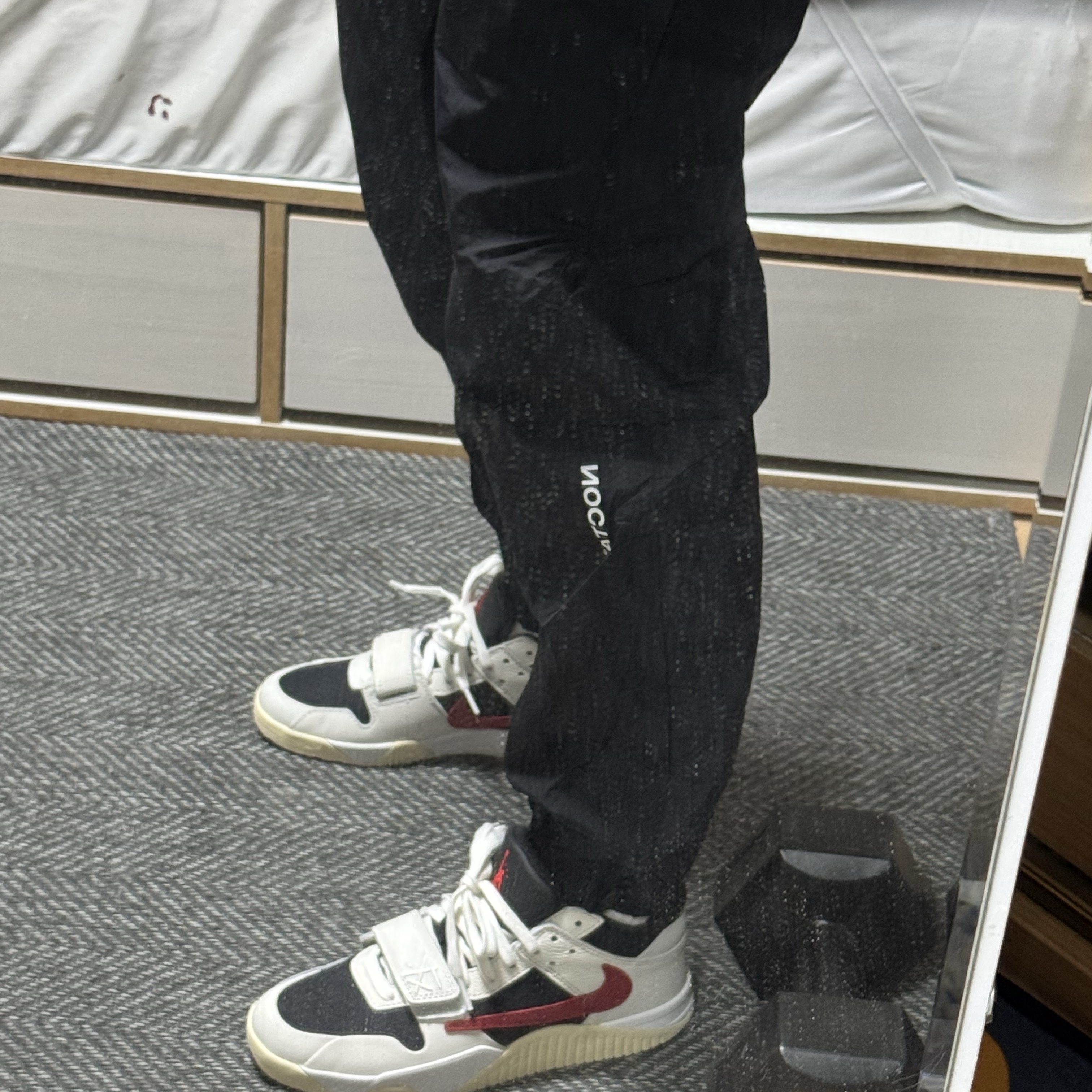 Nike x Drake Nocta Woven Track Pants Black (FN7668-010), Jordan x Travis Scott Jumpman Jack TR University Red 착용 스타일 - 1