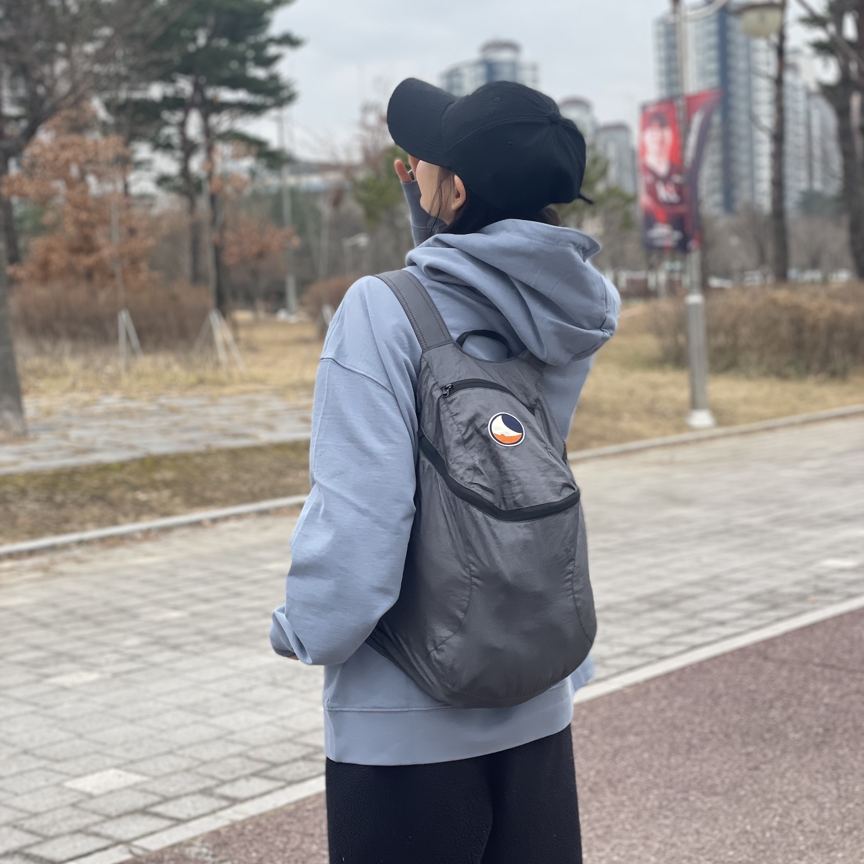 Ticket To The Moon Mini Backpack 15L Dark Grey 착용 스타일