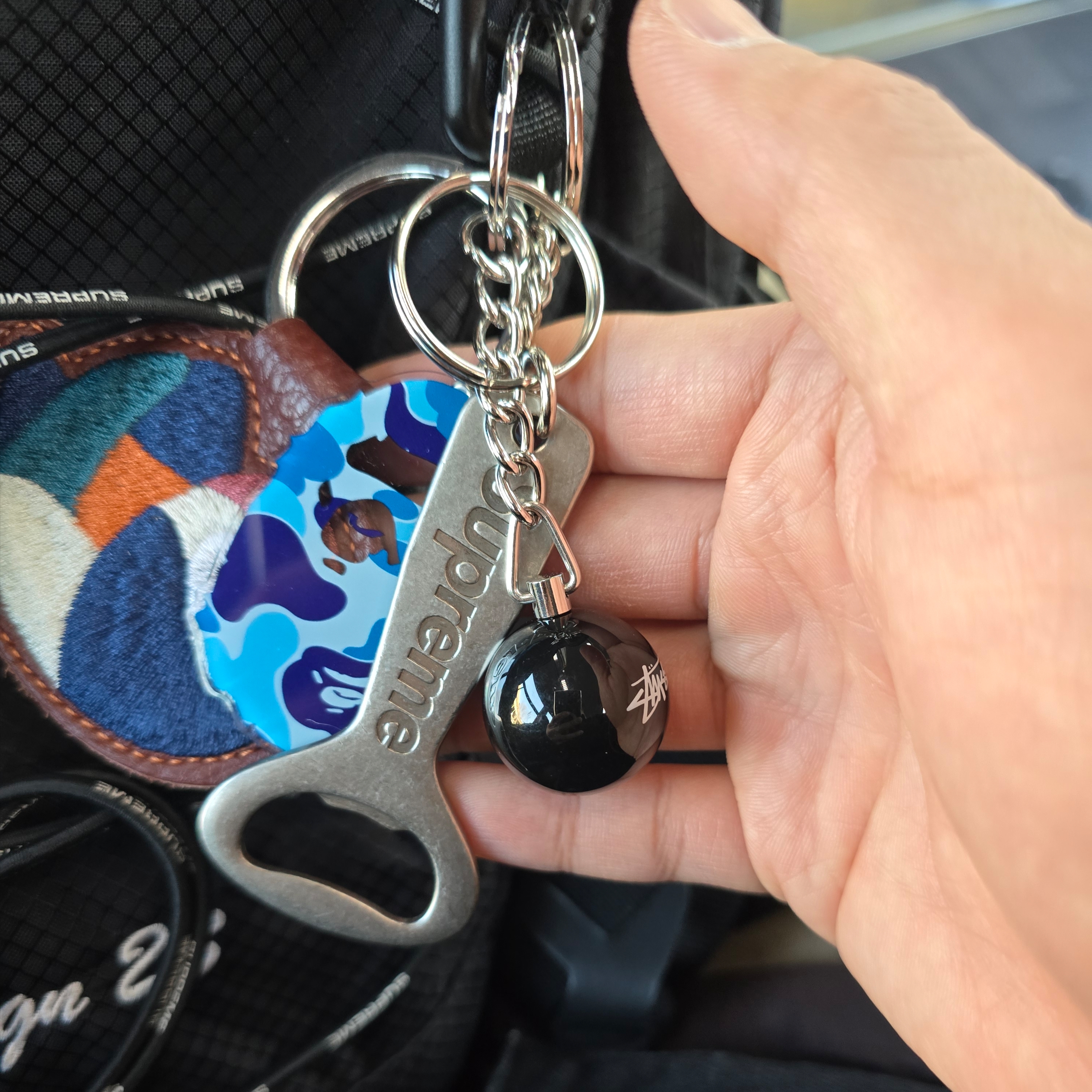 Supreme Bottle Opener Keychain Silver - 24FW, BAPE ABC Camo Ape Head Acrylic Keychain Blue 착용 스타일