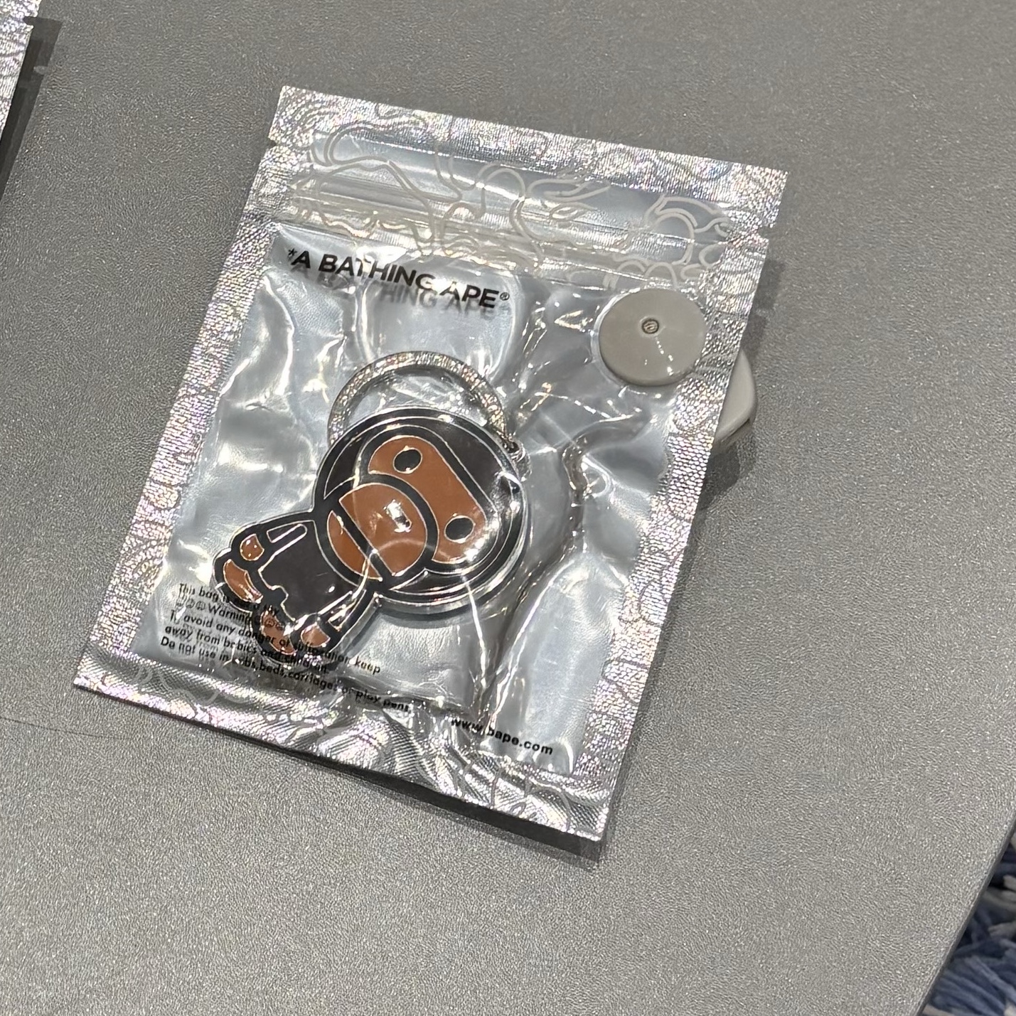 BAPE Baby Milo Metal Keychain Brown 착용 스타일