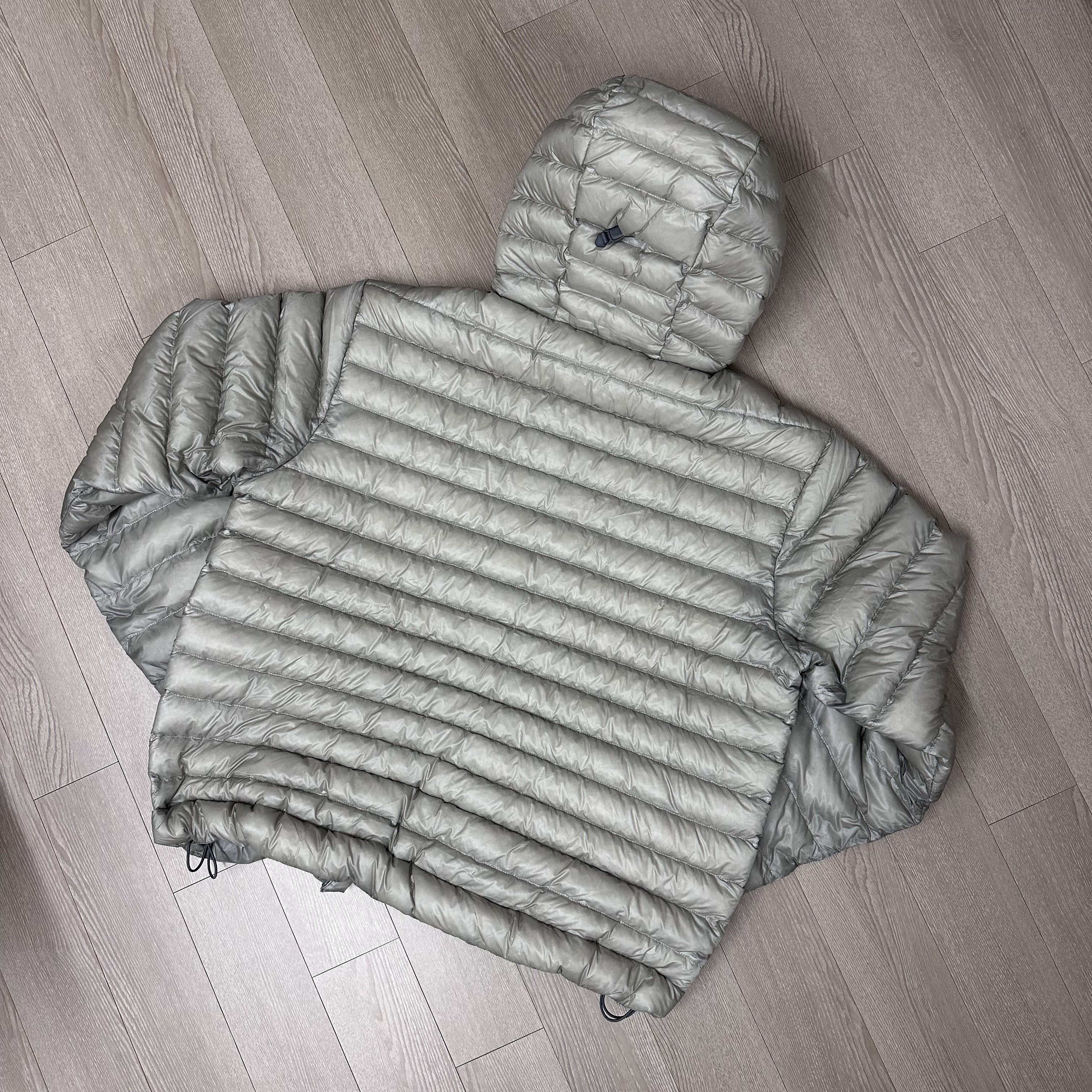 Musinsa Standard City Leisure Sheer Ripstop Hooded Light Down Jacket Light Grey 착용 스타일 - 2