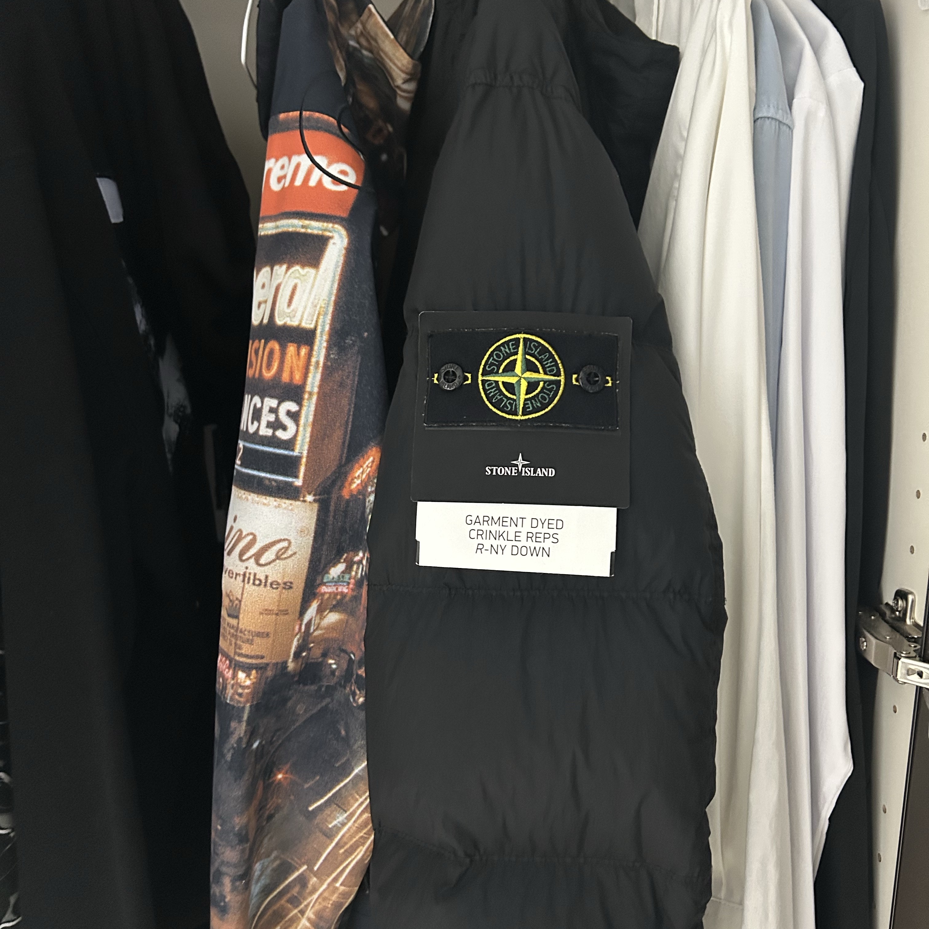 Stone Island 4100012 Crinkle Reps NY Recycled Nylon Wind Resistant Down Parka Black - 25FW, Supreme x The North Face Taped Seam Shell Jacket Times Square - 22FW 착용 스타일