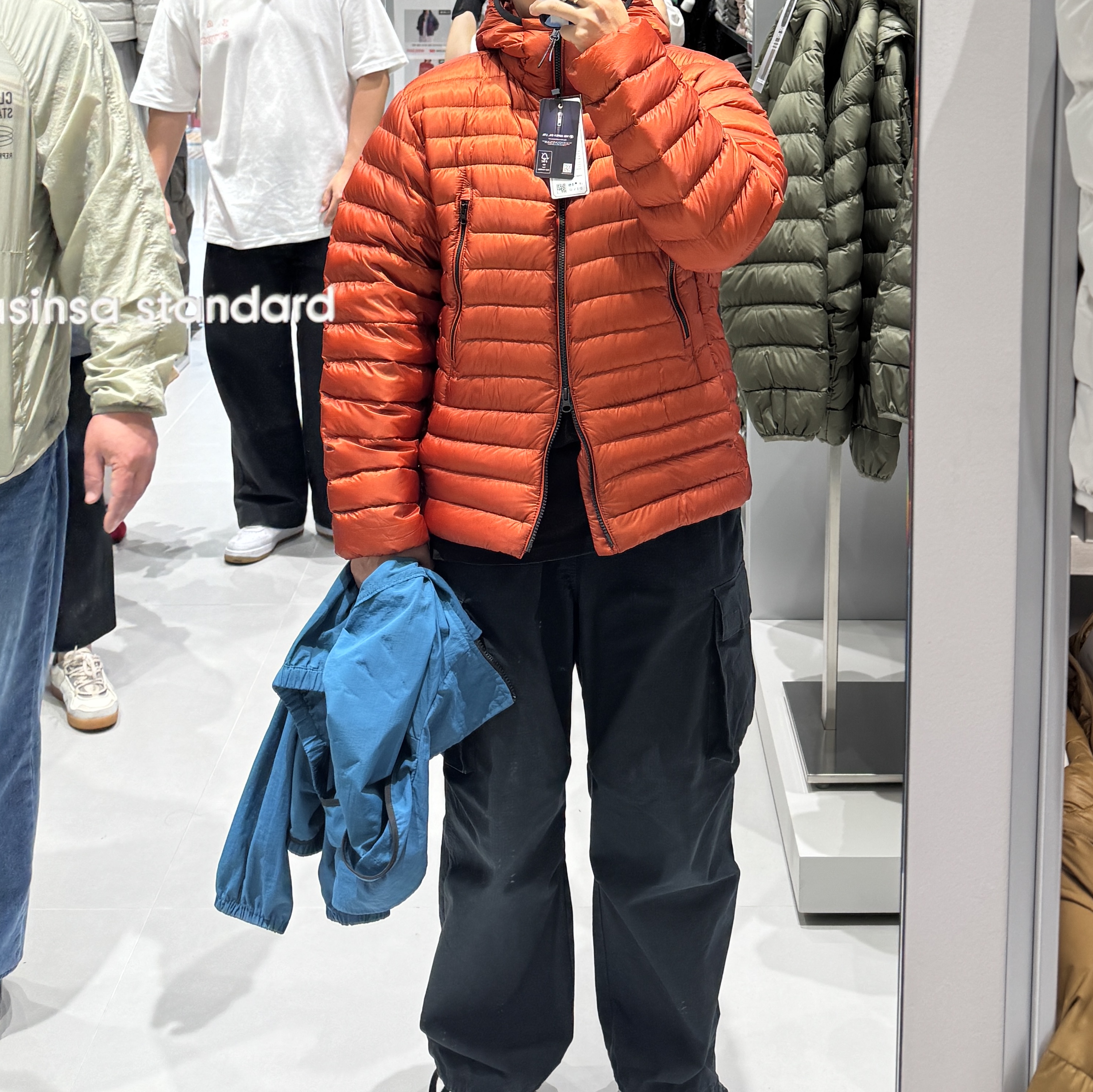 Musinsa Standard City Leisure Sheer Ripstop Hooded Light Down Jacket Orange 착용 스타일 - 1