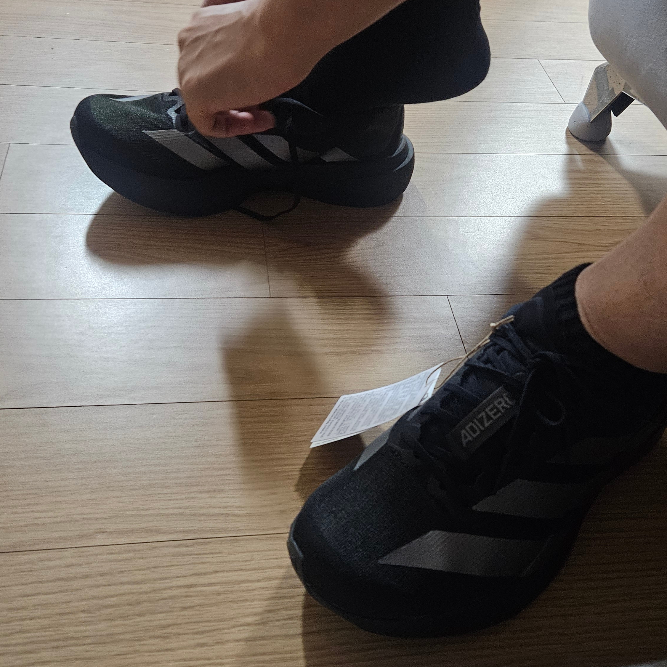 Adidas Adizero EVO SL Core Black Iron Metallic 착용 스타일