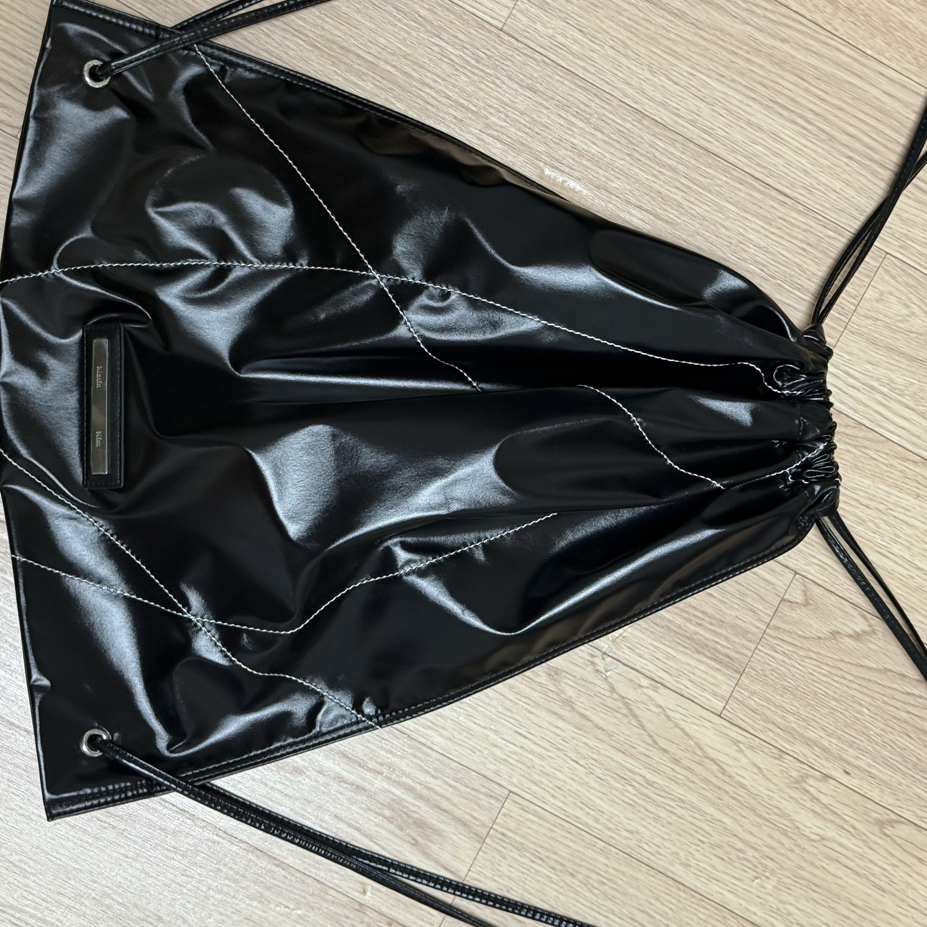 Matin Kim String Coating Backpack Black 착용 스타일