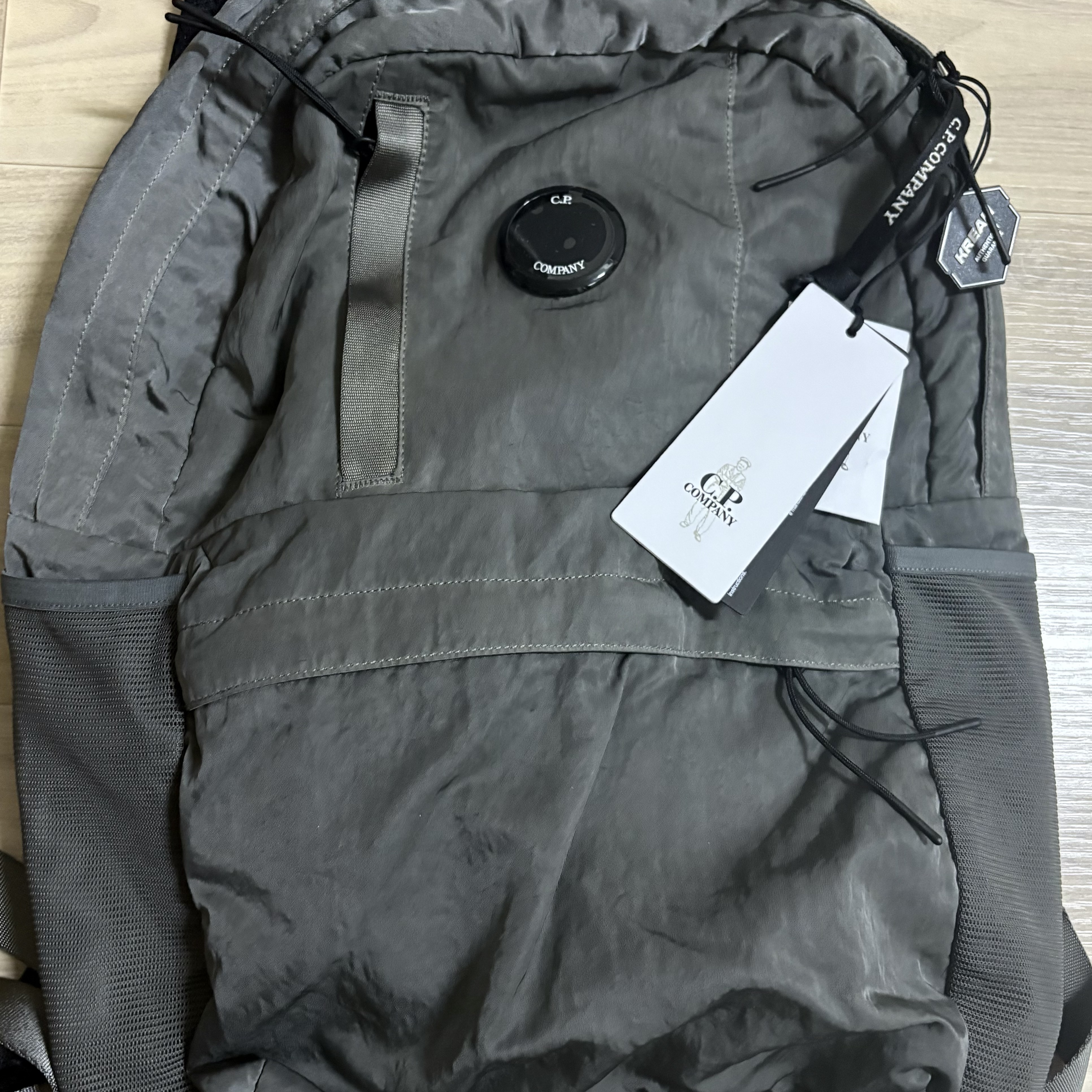 C.P. Company Nylon B Lens Backpack Gunmetal Grey - 25FW 착용 스타일