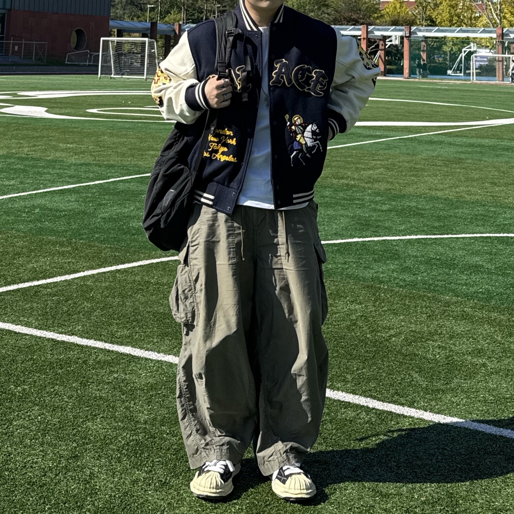 Palace Saints Varsity Jacket Navy - 24SS, Needles H.D. BDU Pants Olive 착용 스타일 - 1
