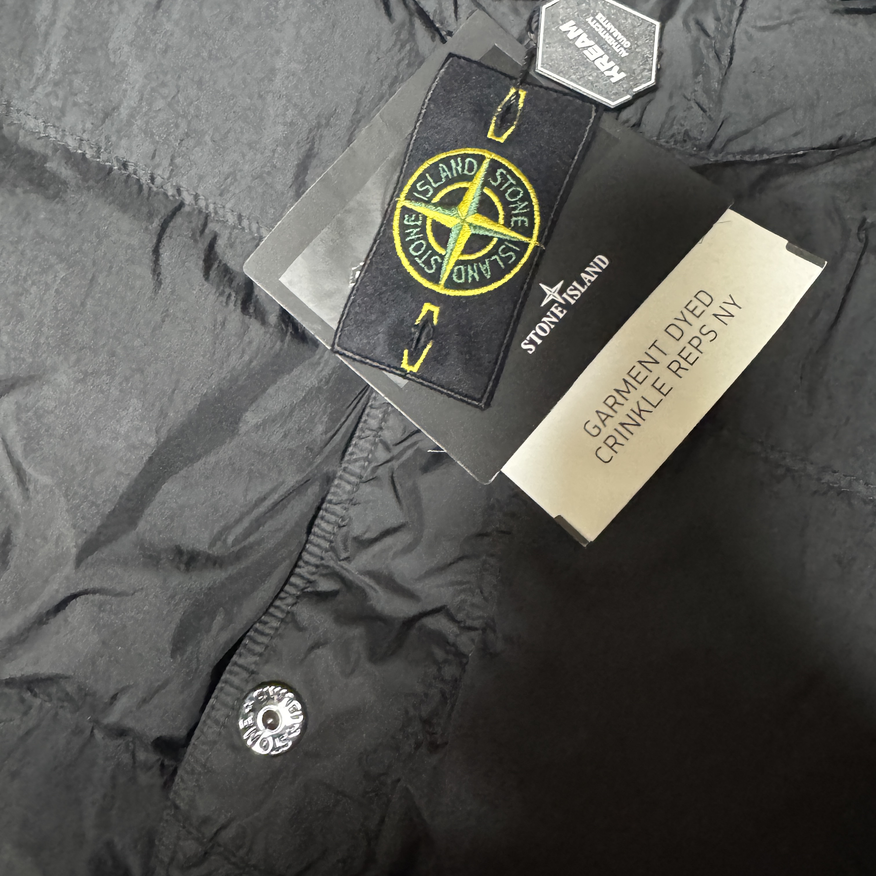 Stone Island 4100010 Crinkle Reps NY Recycled Nylon Down Jacket with Wind Resistant Black - 25FW 착용 스타일