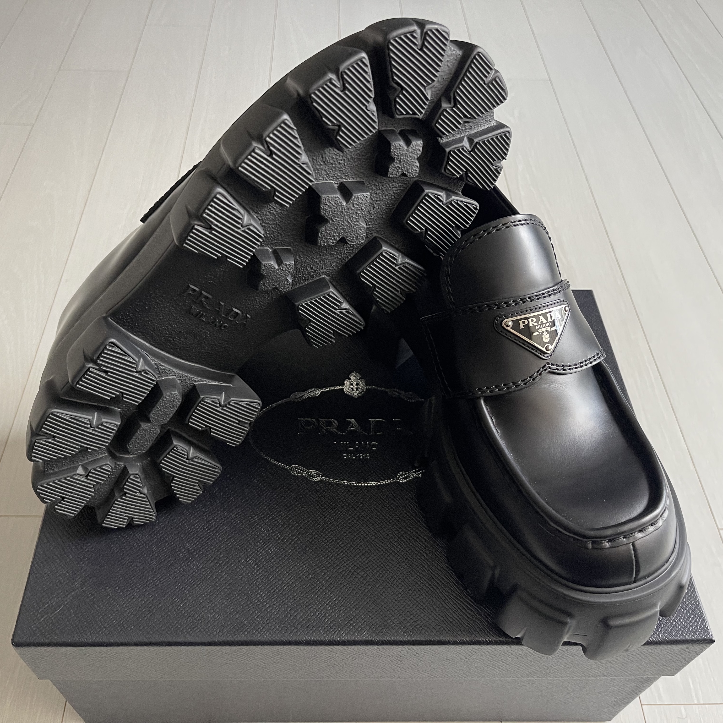 Prada Monolith Brushed Leather Loafers Black 착용 스타일 - 1