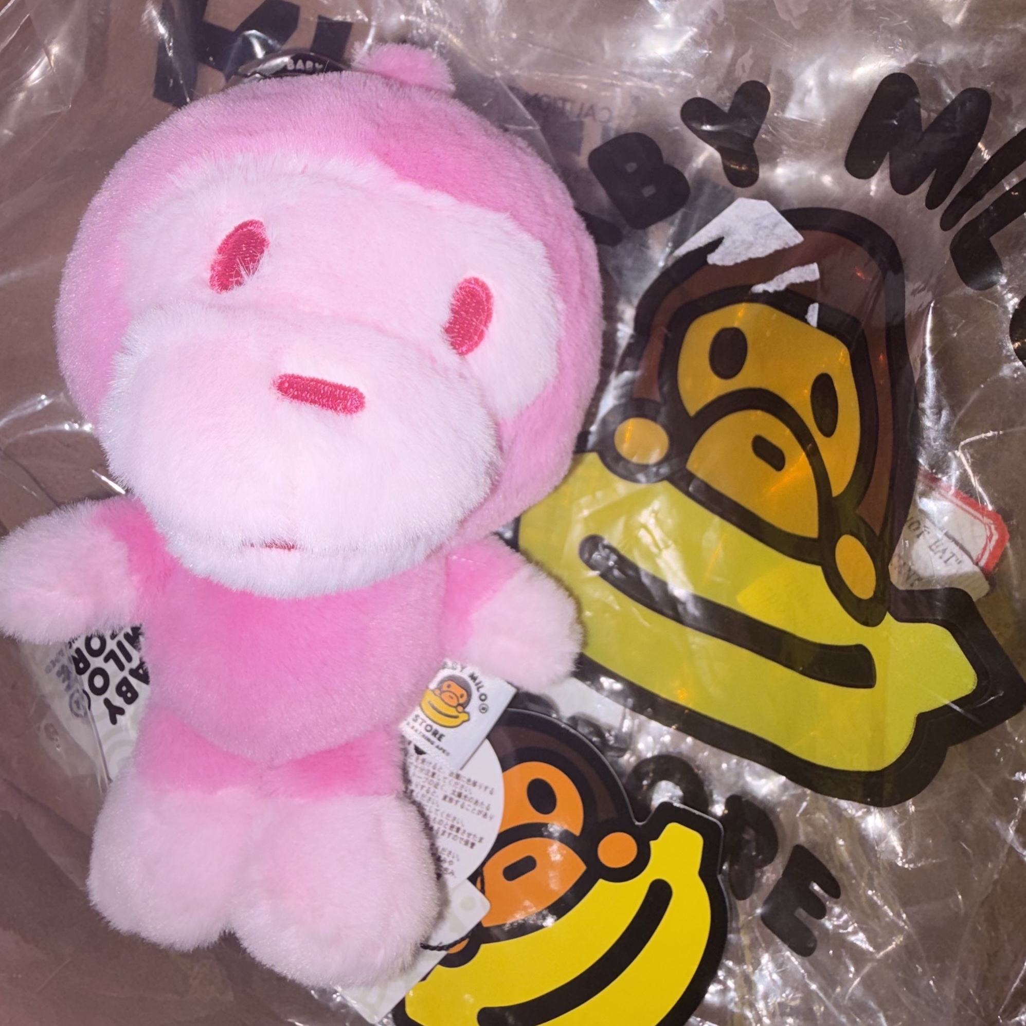 BAPE Baby Milo Plush Doll Keychain Light Pink 착용 스타일