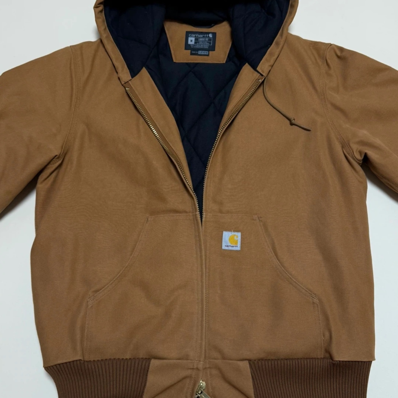 Carhartt Loose Fit Firm Duck Regular Insulated Flannel Lined Active Jacket Carhartt Brown 착용 스타일