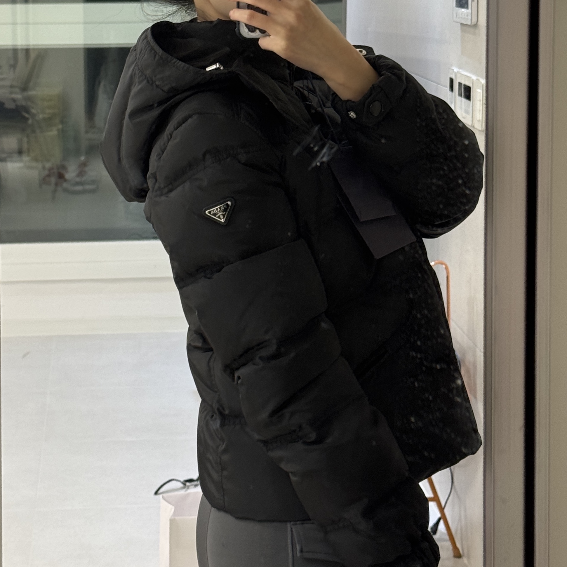 (W) Prada Triangle Logo Down Jacket Black 착용 스타일