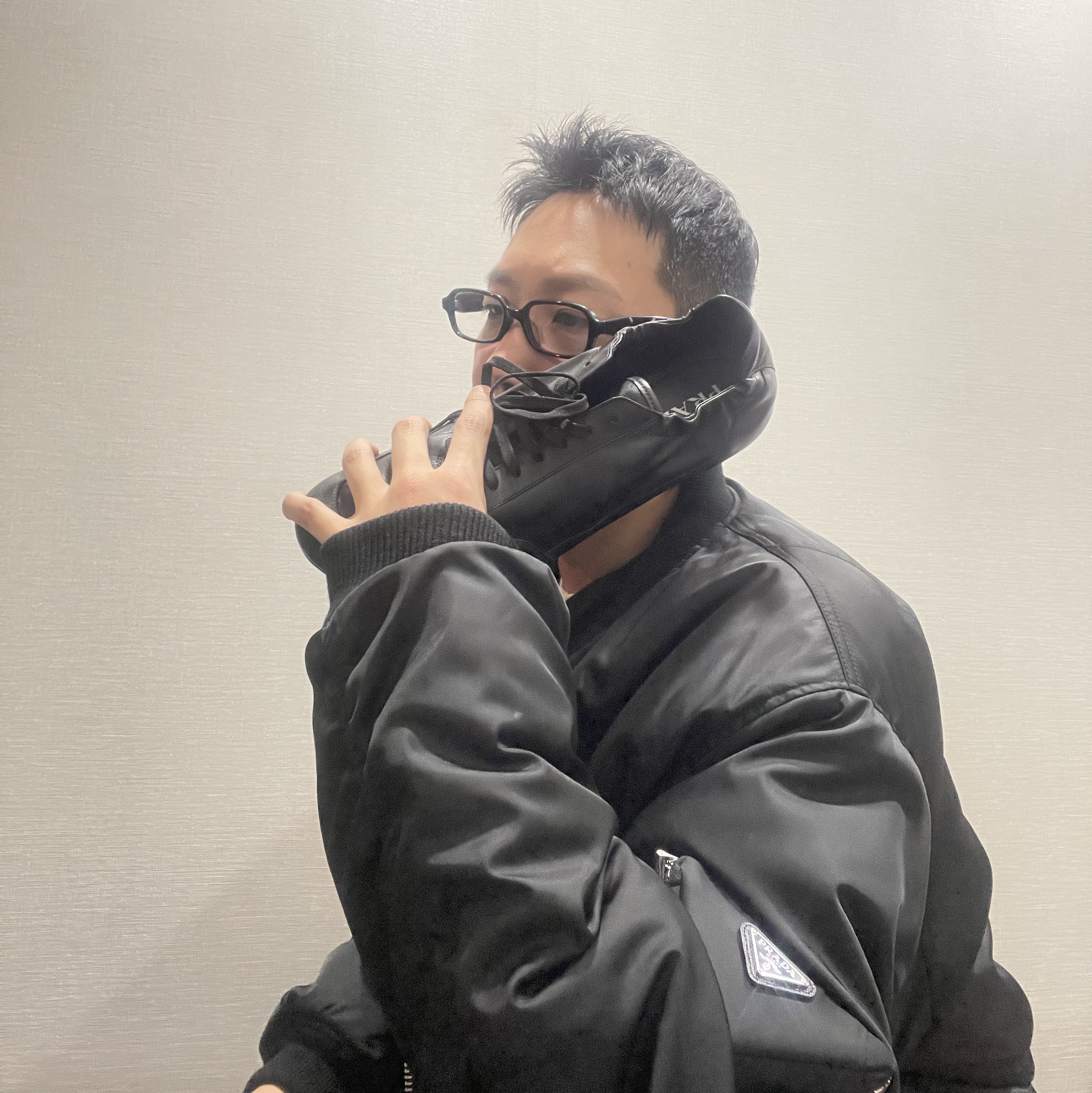 Prada Collapse Leather Sneakers Black, Prada Re-Nylon Bomber Jacket Black 착용 스타일 - 1