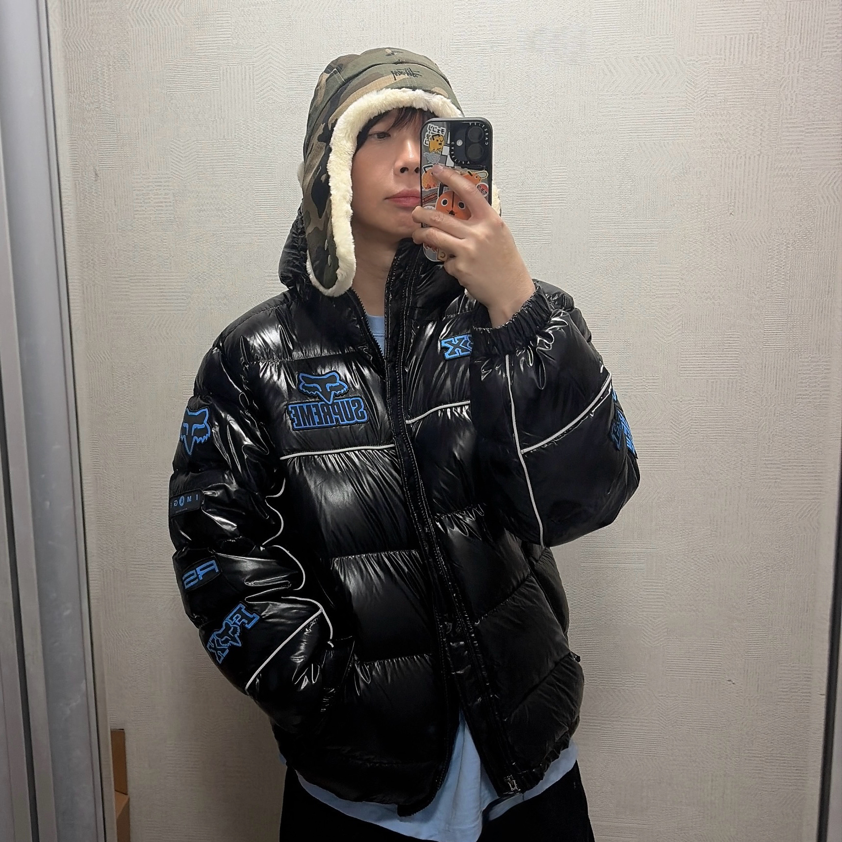 Stussy Ripstop Trapper Cap Camo, Supreme x Fox Racing Shiny Down Puffer Jacket Black - 25FW 착용 스타일 - 1
