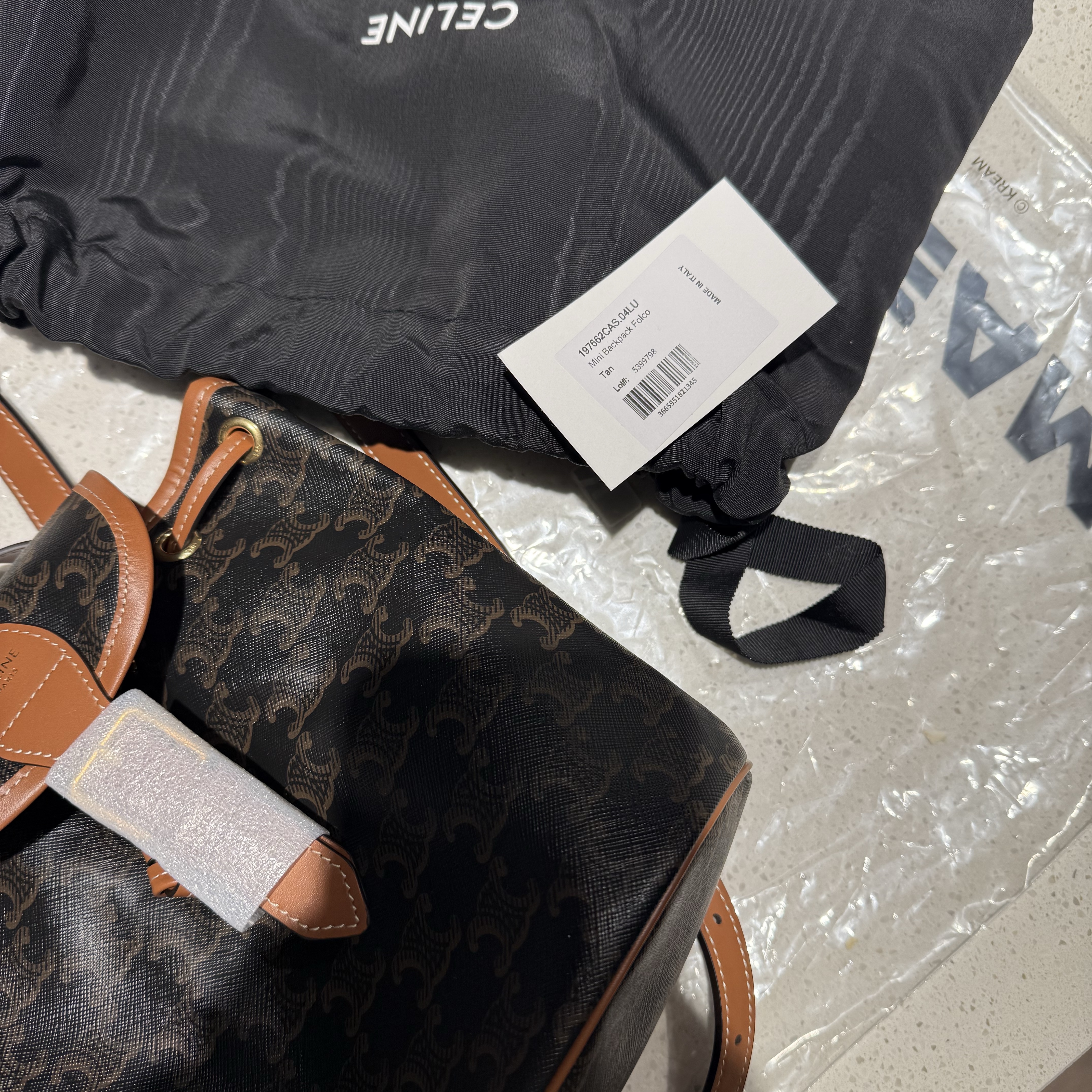 Celine Mini Backpack Folco in Triomphe Canvas and Calfskin Tan 착용 스타일